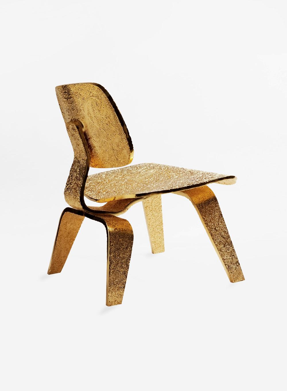 https://a.1stdibscdn.com/contemporary-paolo-giordano-ethno-eames-chair-gold-edition-cast-for-sale-picture-2/f_59042/f_269772821642614692907/Ethno_Eames_Gold_B_master.jpg