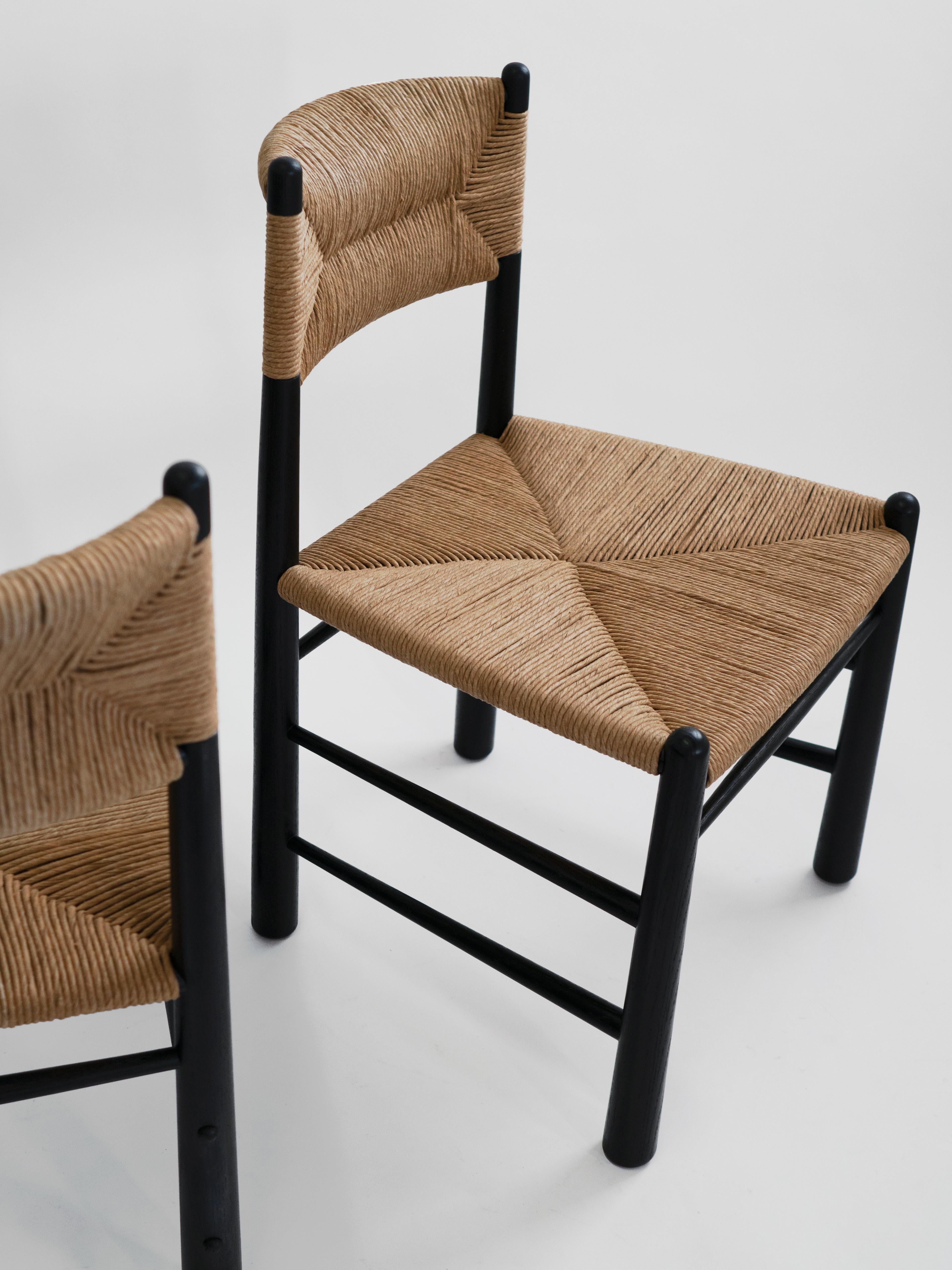 https://a.1stdibscdn.com/ewa-dining-chair-white-oak-and-natural-fibre-rush-for-sale-picture-8/f_26683/f_275985821646253949790/Ewa_black_two_front_side_master.jpg