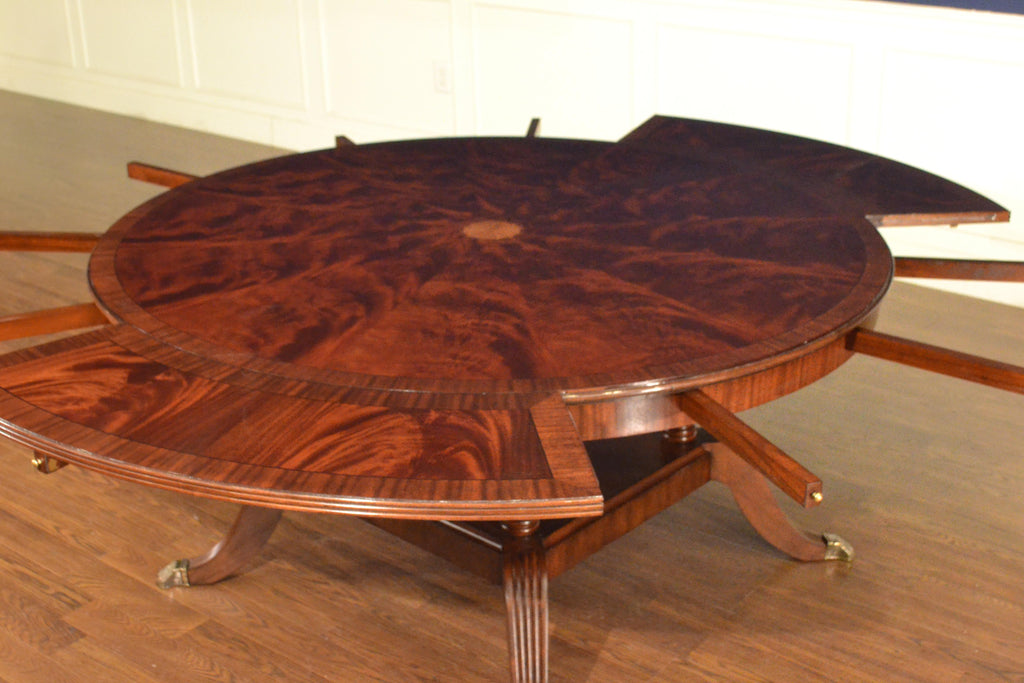 https://a.1stdibscdn.com/large-round-perimeter-leaf-mahogany-georgian-style-dining-table-by-leighton-hall-for-sale-picture-10/f_44162/f_146972821557706140380/F67791CD_D8F1_4161_82C3_22AF9C2B0C25_master.jpeg