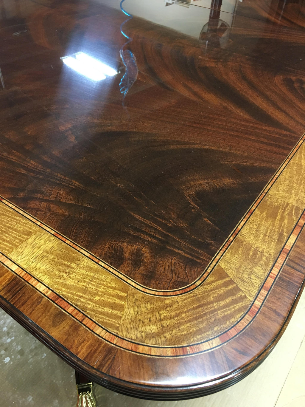 https://a.1stdibscdn.com/large-mahogany-georgian-style-dining-table-by-leighton-hall-for-sale-picture-5/f_44162/f_13542132/F75C719B_0739_46A4_BB90_1549111258163_master.jpeg