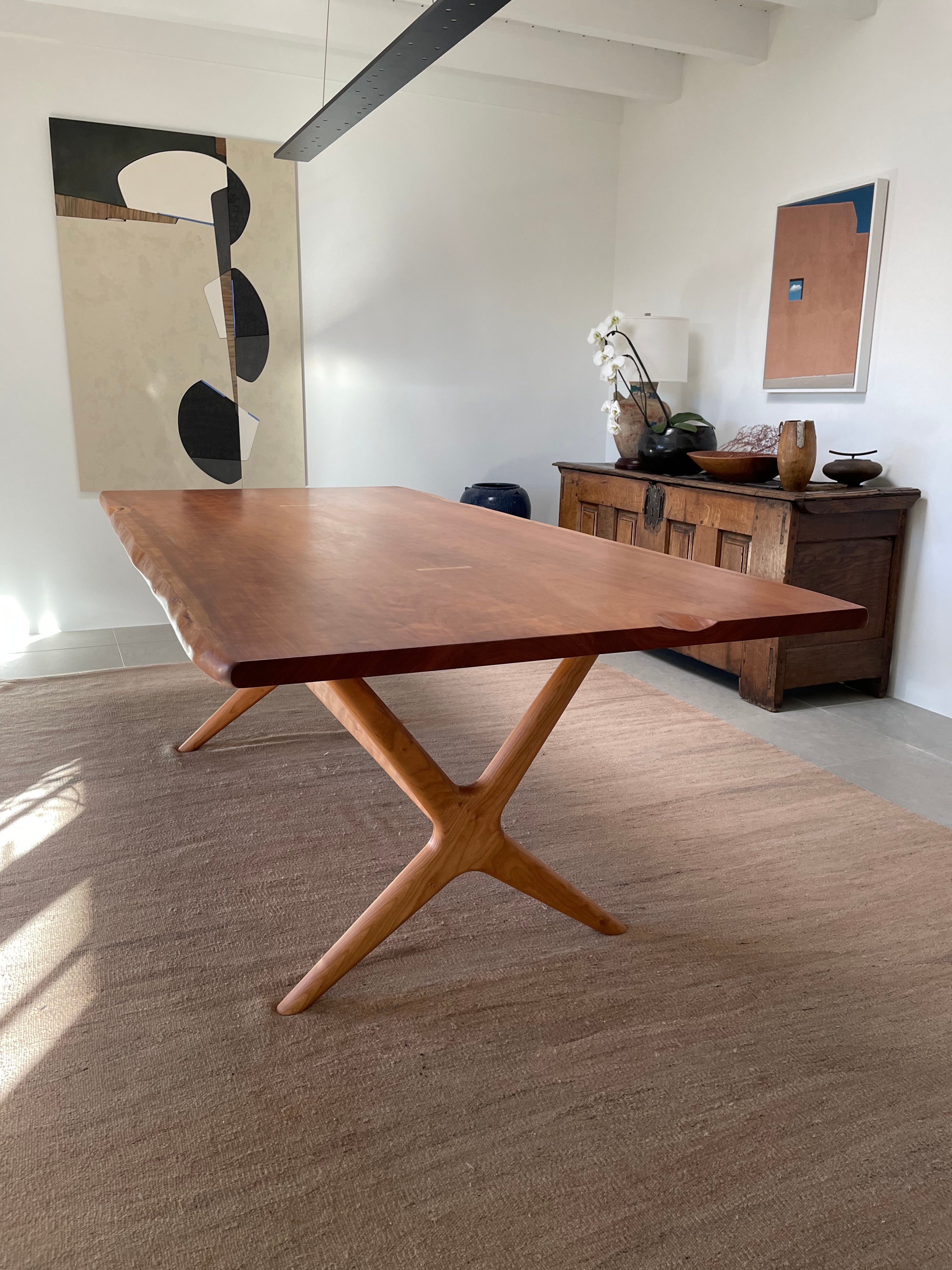 https://a.1stdibscdn.com/dining-table-in-cherry-with-our-x-base-by-boyd-allister-for-sale-picture-2/f_61282/1642535496572/F9E7C5F7_6A10_4FCA_97CC_11E02569B0C9_org.jpeg