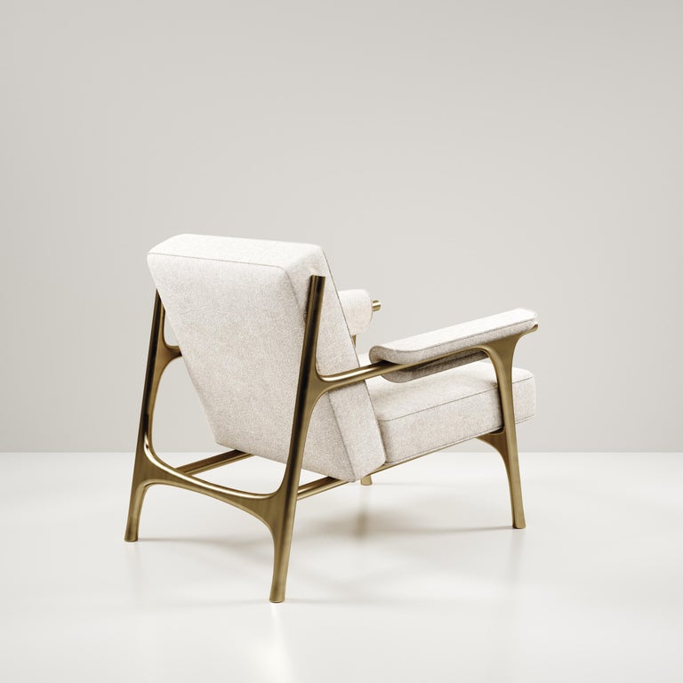 https://a.1stdibscdn.com/upholstered-armchair-with-bronze-patina-brass-details-by-ry-augousti-for-sale-picture-3/f_45491/f_258078421634888228108/FAUTEUIL_CLEMENCE0003_master.jpg?width=768