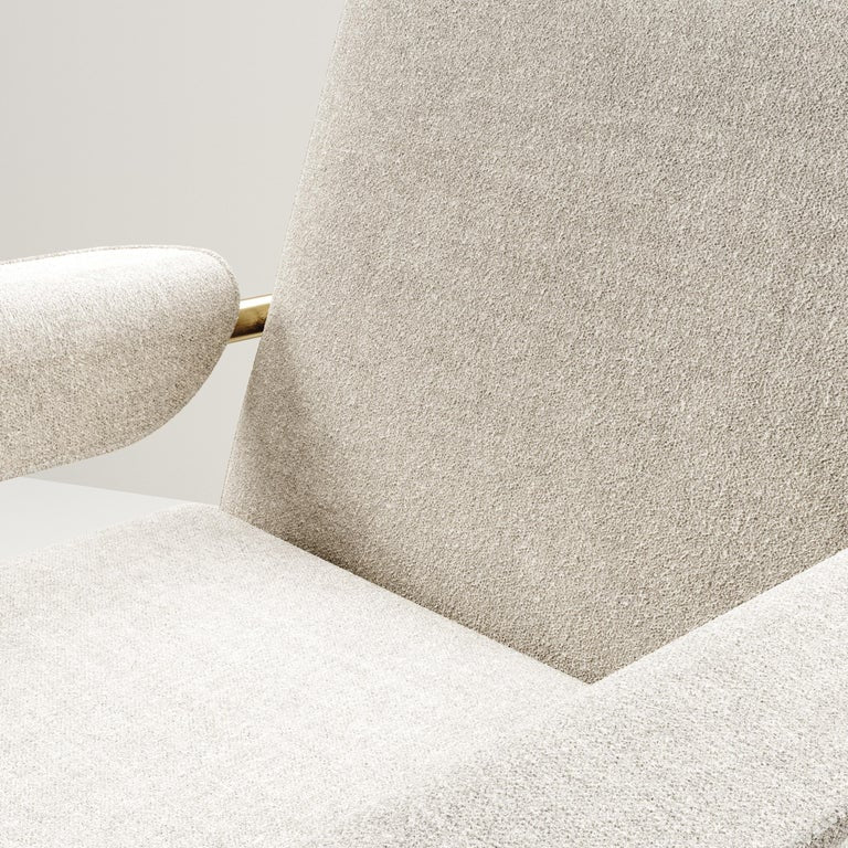 https://a.1stdibscdn.com/upholstered-armchair-with-bronze-patina-brass-details-by-ry-augousti-for-sale-picture-4/f_45491/f_258078421634888234851/FAUTEUIL_CLEMENCE0005_master.jpg?width=768