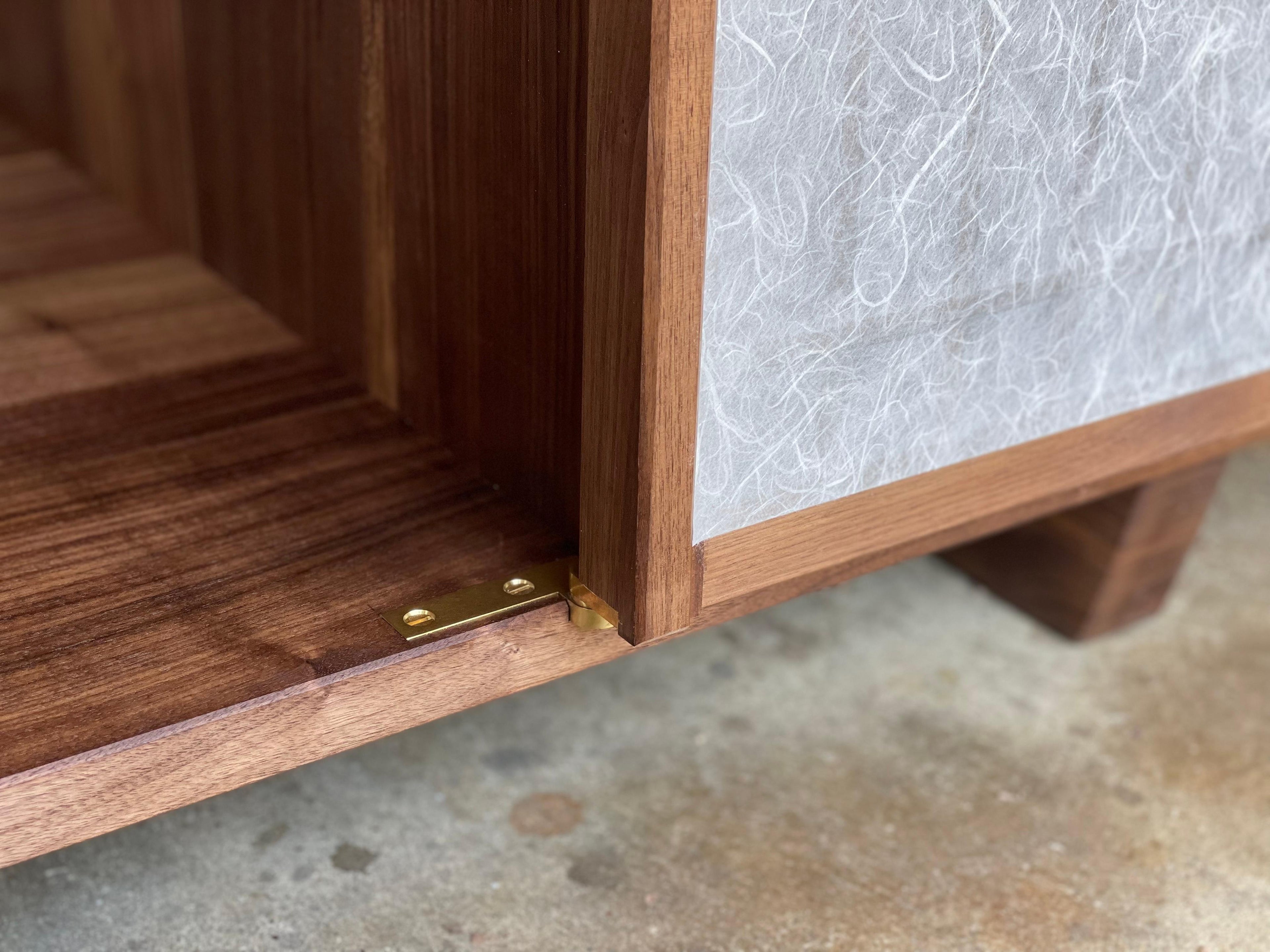 https://a.1stdibscdn.com/walnut-media-cabinet-room-divider-with-shoji-doors-for-sale-picture-9/f_45782/f_291309321655341950464/FD34E125_6F95_4396_9F03_0CA2D6760D19_master.jpeg