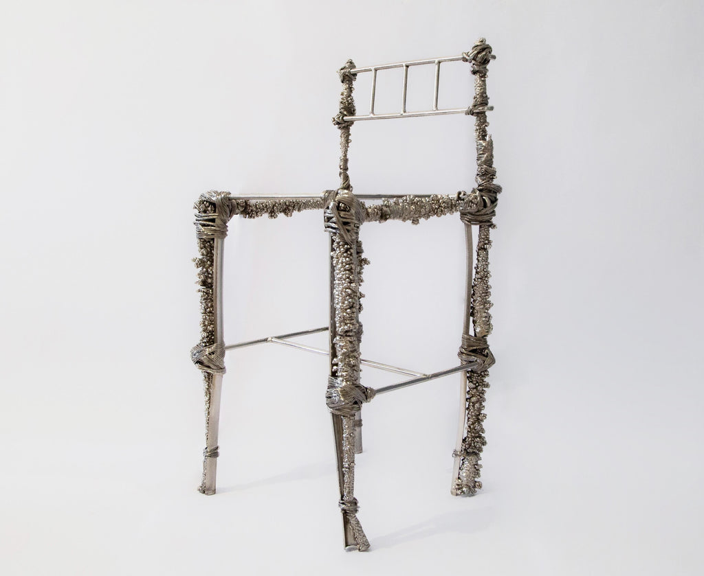 https://a.1stdibscdn.com/fisherman-chair-sculptural-chair-in-recycled-nickel-chrome-copper-steel-for-sale-picture-3/f_69682/f_483652021768588125940/FISHERMANCHAIR01_master.jpg