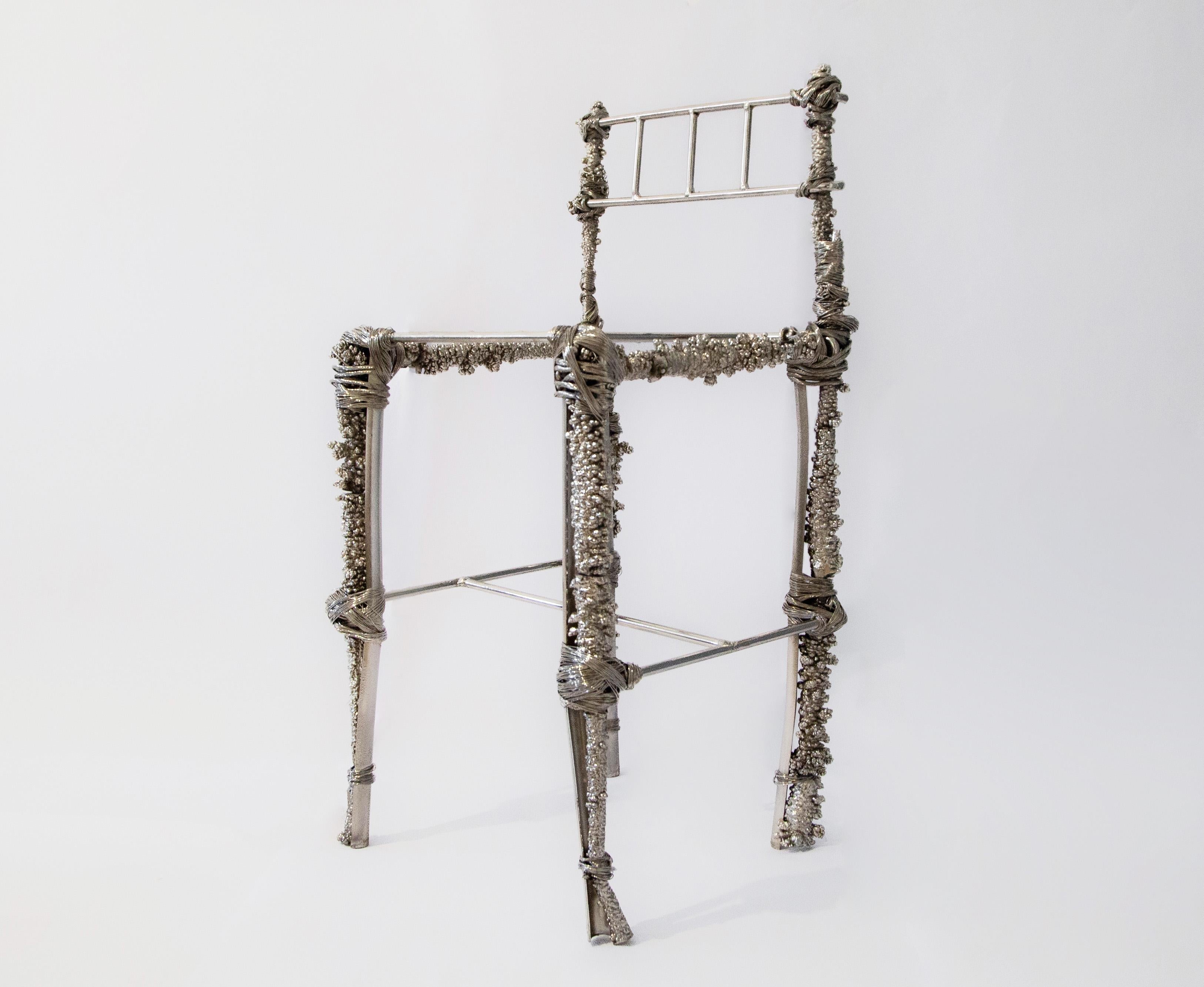 https://a.1stdibscdn.com/fisherman-chair-sculptural-chair-in-recycled-nickel-chrome-copper-steel-for-sale-picture-3/f_69682/f_483652021768588125940/FISHERMANCHAIR01_master.jpg