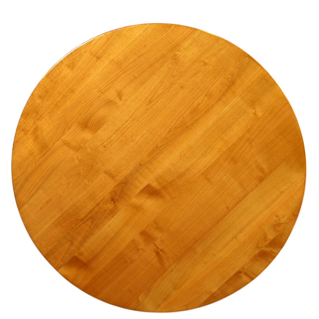 https://a.1stdibscdn.com/round-table-with-a-central-foot-and-2-extensions-in-solid-cherry-for-sale-picture-3/f_57342/f_264612821639062911865/FLA_5703M_ex_1852_plateau_dessus_table_ronde_merisier_f_t_central_d_tour_3000x3000_master.jpeg