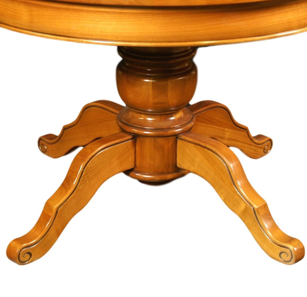https://a.1stdibscdn.com/round-table-with-a-central-foot-and-2-extensions-in-solid-cherry-for-sale-picture-4/f_57342/f_264612821639063390774/FLA_5703M_ex_1852_table_ronde_merisier_f_t_central_d_tail_pied_central_1957x1957_master.jpeg