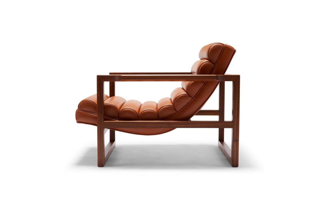 https://a.1stdibscdn.com/contemporary-fluted-florence-easy-chair-in-tan-leather-and-oiled-walnut-frame-for-sale-picture-2/f_27813/f_246717921627376922568/FLORENCE_EASY_CHAIR_2_master.jpg
