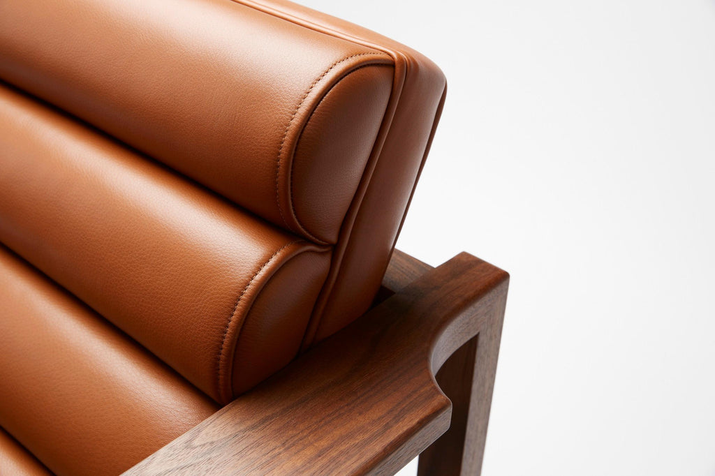 https://a.1stdibscdn.com/contemporary-fluted-florence-easy-chair-in-tan-leather-and-oiled-walnut-frame-for-sale-picture-7/f_27813/f_246717921627376941597/FLORENCE_EASY_CHAIR_6_master.jpg