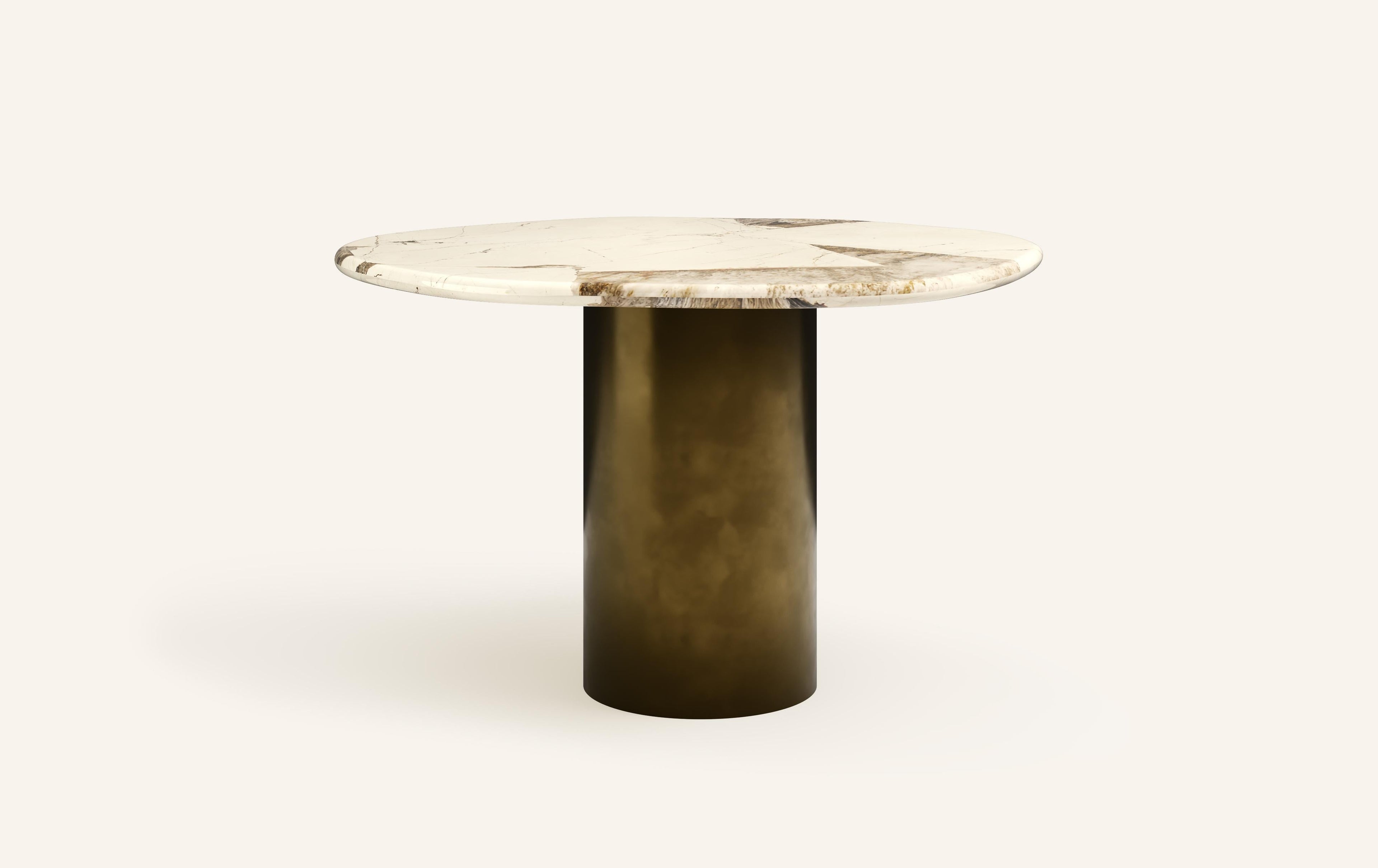 https://a.1stdibscdn.com/formla-lago-round-dining-table-42l-x-42w-x-30h-quartzite-antique-marble-for-sale-picture-2/f_98022/f_396512921715299966020/FORM_LAGO_ROUND_DINING_TABLE_48_PATAGONIA_1_master.jpg