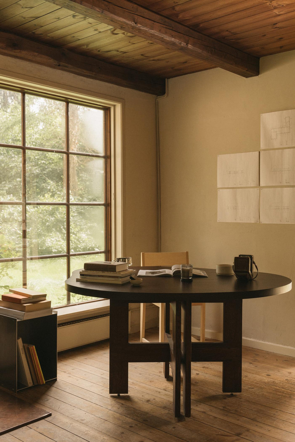 https://a.1stdibscdn.com/contemporary-trestle-dining-table-farmhouse-by-frama-natural-oak-pond-for-sale-picture-10/f_31233/f_483613921768580750463/FRAMA_Farmhouse_Trestle_Table_Dark_Oak_Pond_Context_1_master.jpg