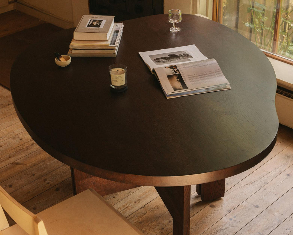 https://a.1stdibscdn.com/contemporary-trestle-dining-table-farmhouse-by-frama-natural-oak-pond-for-sale-picture-13/f_31233/f_483613921768580750374/FRAMA_Farmhouse_Trestle_Table_Dark_Oak_Pond_Context_5_master.jpg
