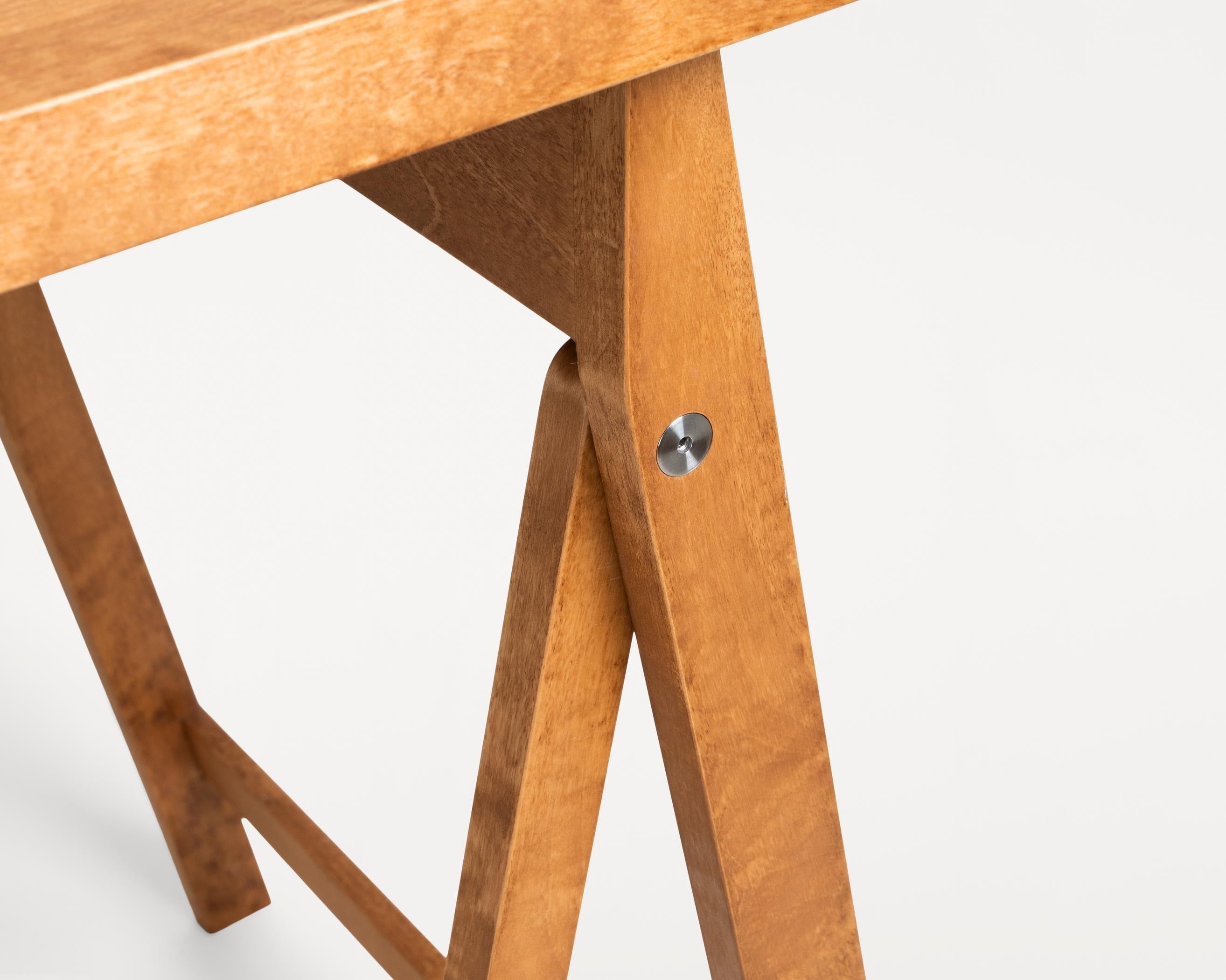 https://a.1stdibscdn.com/contemporary-folding-flat-trestle-table-by-frama-warm-brown-birch-for-sale-picture-2/f_31233/f_483344621768473096122/FRAMA_Folding_Flat_Table_Packshot_23_master.jpg