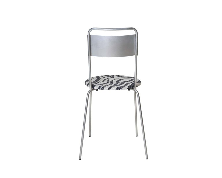https://a.1stdibscdn.com/contemporary-chair-petit-rond-troels-grum-schwensen-x-frama-steel-and-zebra-for-sale-picture-2/f_31233/f_479344221765367684698/FRAMA_Petit_Rond_Zebra_Packshot_3_master.jpg?width=768