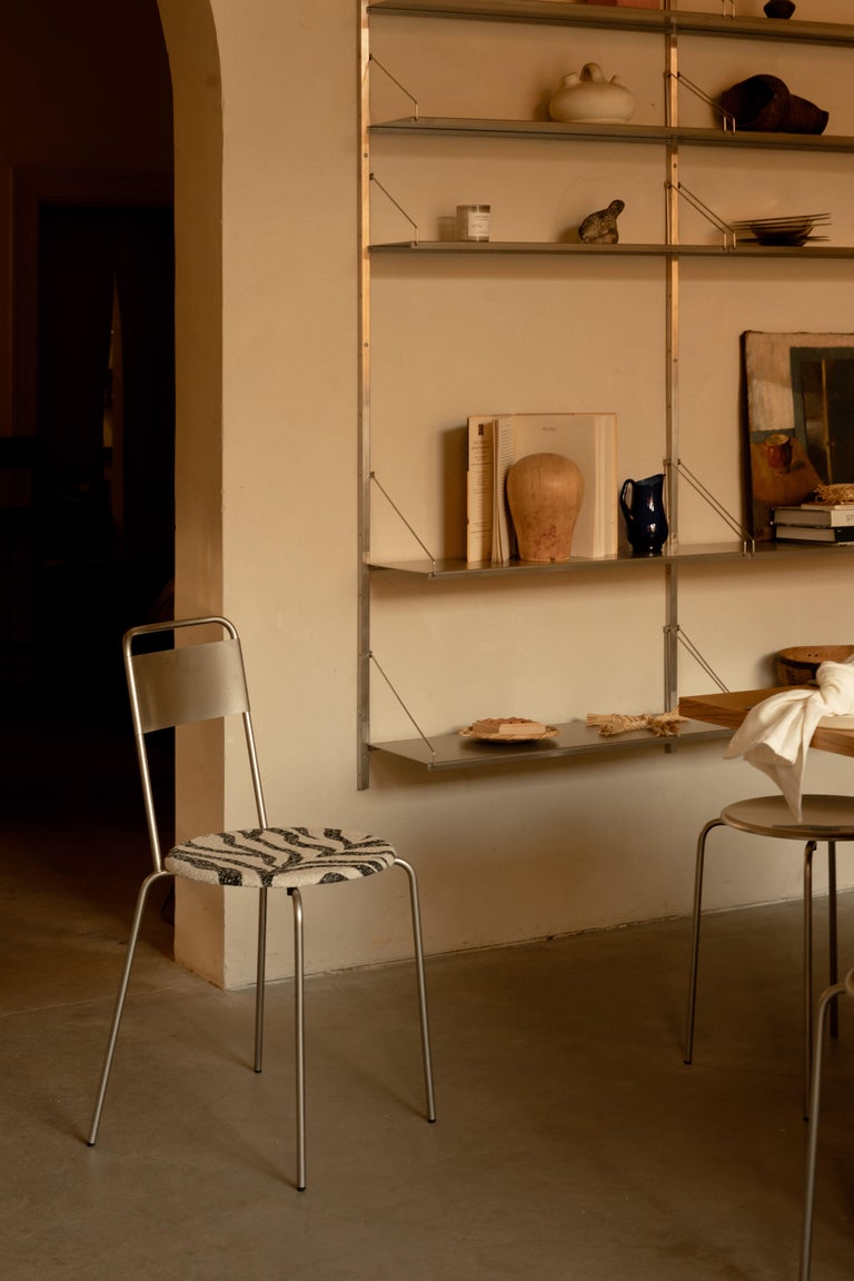 https://a.1stdibscdn.com/contemporary-chair-petit-rond-troels-grum-schwensen-x-frama-steel-and-zebra-for-sale-picture-8/f_31233/f_479344221765367593888/FRAMA_x_Kvadrat_Event_Context_Image_13_min_master.jpg?width=768
