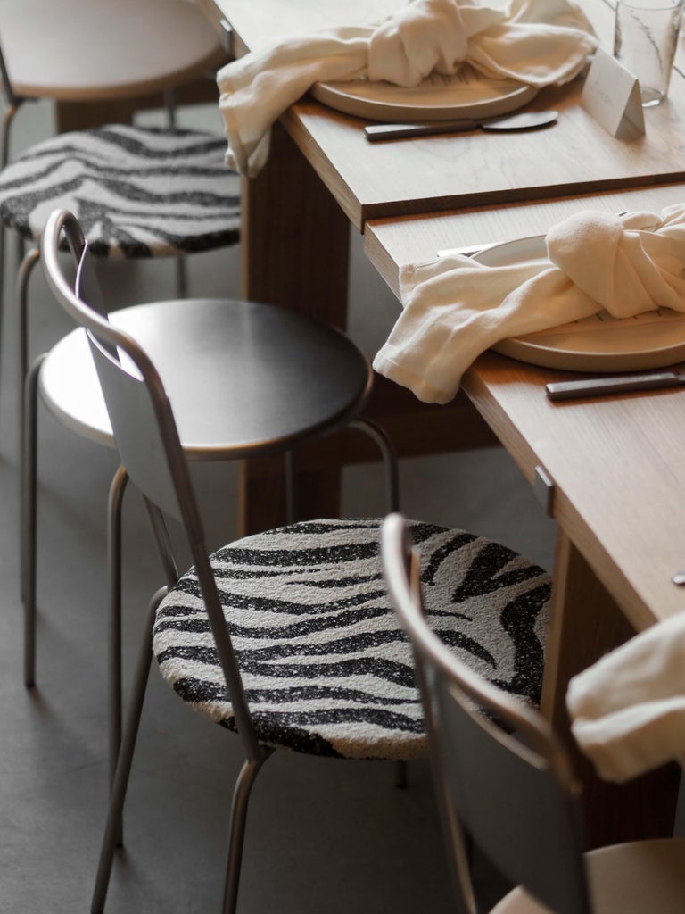 https://a.1stdibscdn.com/contemporary-chair-petit-rond-troels-grum-schwensen-x-frama-steel-and-zebra-for-sale-picture-6/f_31233/f_479344221765367594381/FRAMA_x_Kvadrat_Event_Context_Image_17_min_master.jpg?width=768