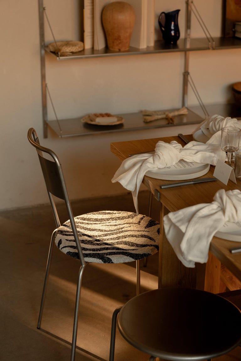 https://a.1stdibscdn.com/contemporary-chair-petit-rond-troels-grum-schwensen-x-frama-steel-and-zebra-for-sale-picture-10/f_31233/f_479344221765367593915/FRAMA_x_Kvadrat_Event_Context_Image_9_min_master.jpg?width=768
