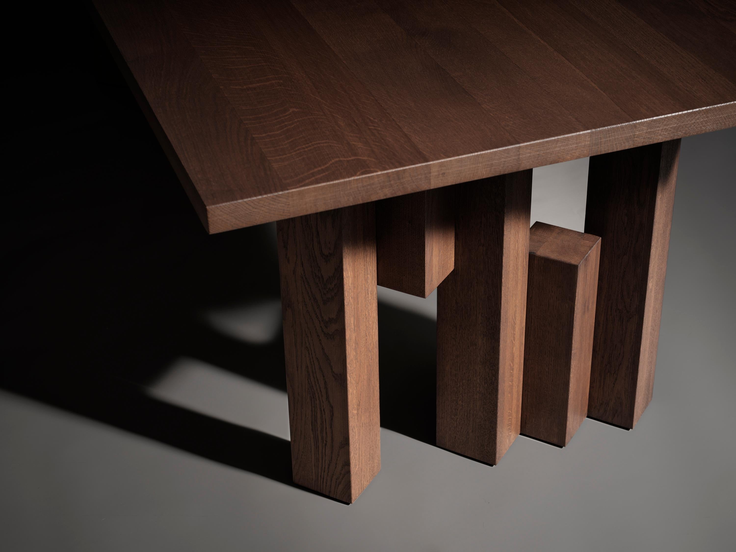 https://a.1stdibscdn.com/modernist-solid-oak-fenestra-dining-table-for-sale-picture-3/f_89302/f_415224421726662099468/Fenestra_Table_Warm_Brown_Leg_Detail_photo_by_Thomas_van_Schaik_master.jpg