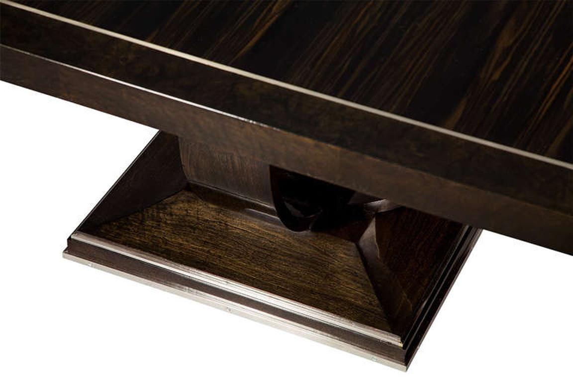 https://a.1stdibscdn.com/custom-made-art-deco-macassar-ebony-dining-table-by-carrocel-for-sale-picture-4/1722654/f_11219881553875615478/FldbrgDiningTblFullCR2012004_l_master.jpg