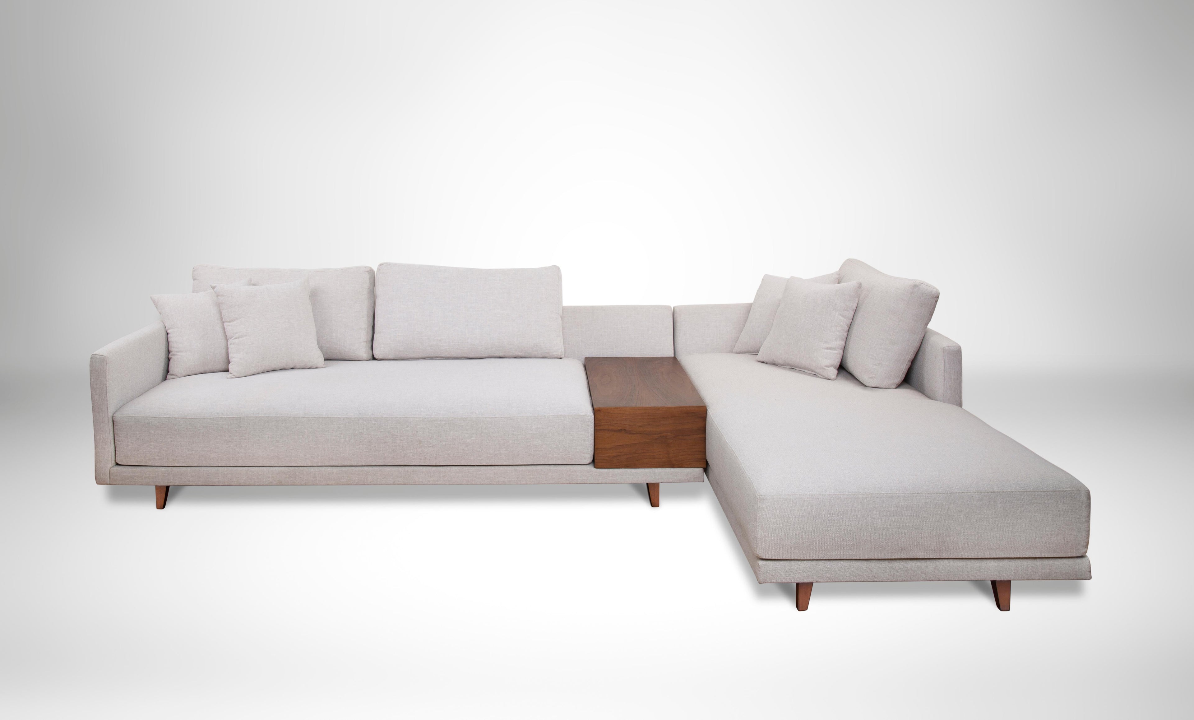 https://a.1stdibscdn.com/l-shaped-sofa-with-built-in-walnut-side-table-with-foam-and-fiber-filling-for-sale-picture-5/f_58022/f_251094521630341387578/Floating_Sofa_master.jpg