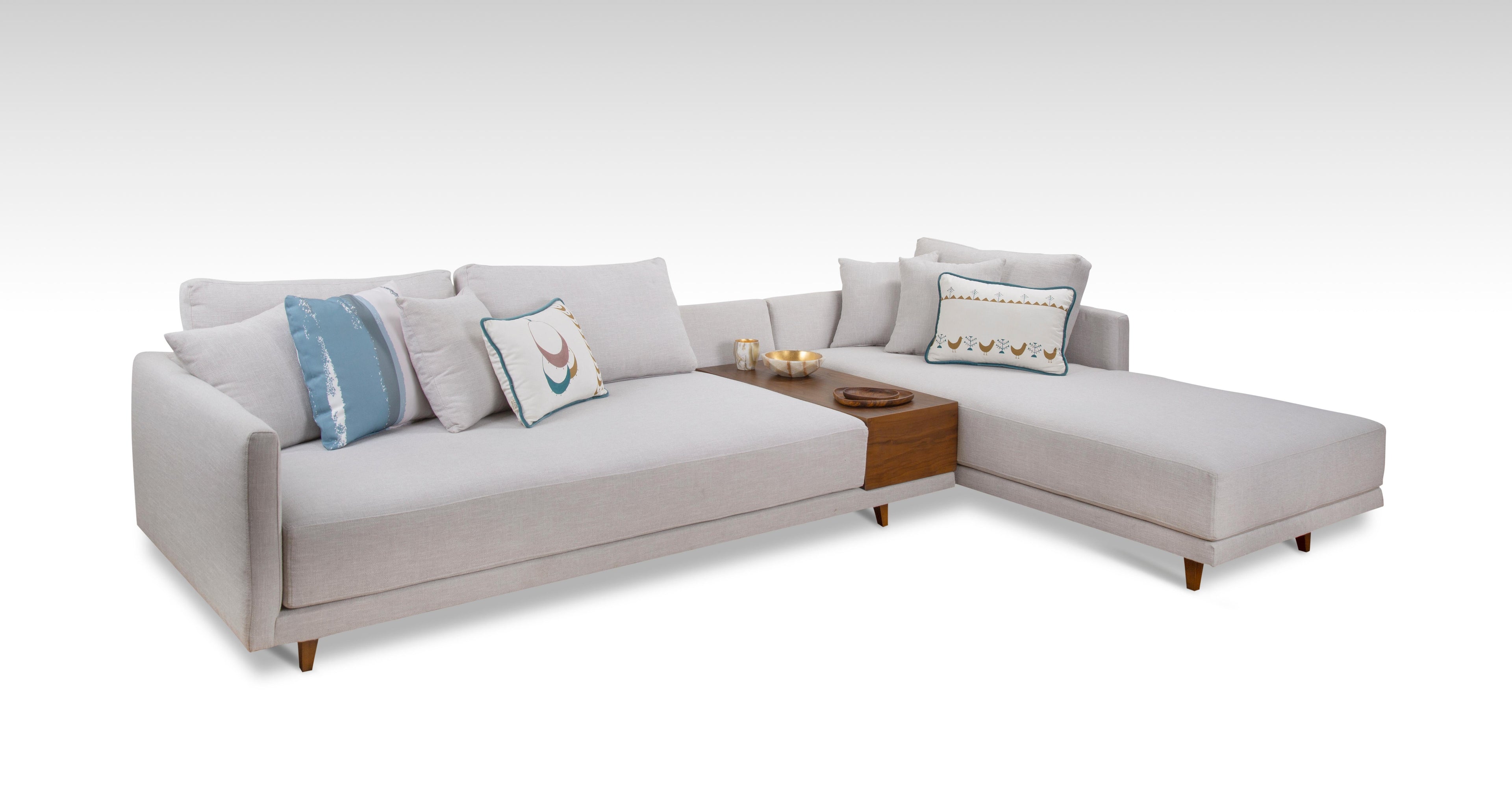 https://a.1stdibscdn.com/l-shaped-sofa-with-built-in-walnut-side-table-with-foam-and-fiber-filling-for-sale-picture-3/f_58022/f_251094521630341386598/Floating_Sofa_with_Accent_Pillows_Angle_master.jpg
