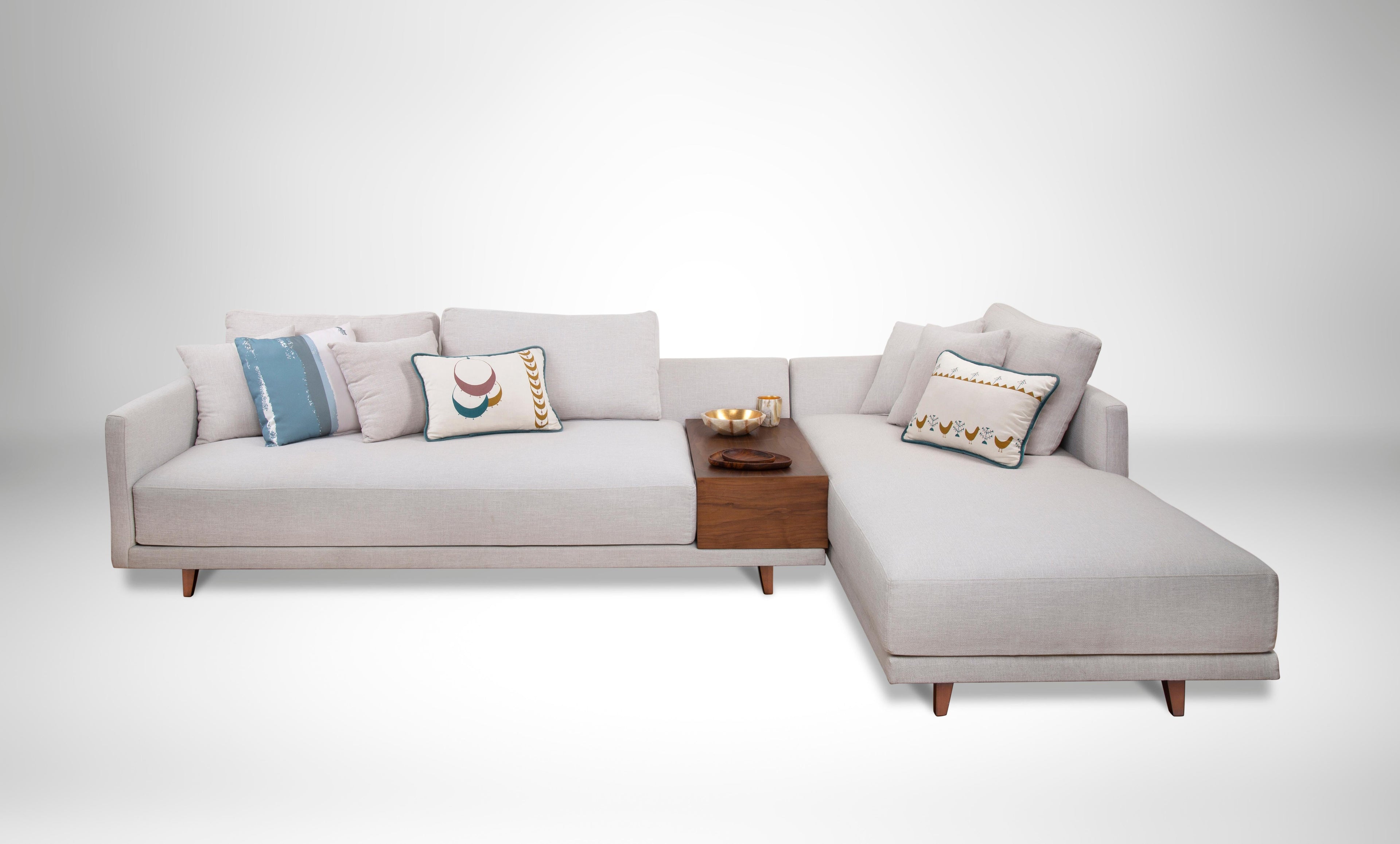 https://a.1stdibscdn.com/l-shaped-sofa-with-built-in-walnut-side-table-with-foam-and-fiber-filling-for-sale-picture-2/f_58022/f_251094521630341387673/Floating_Sofa_with_Cushions_master.jpg
