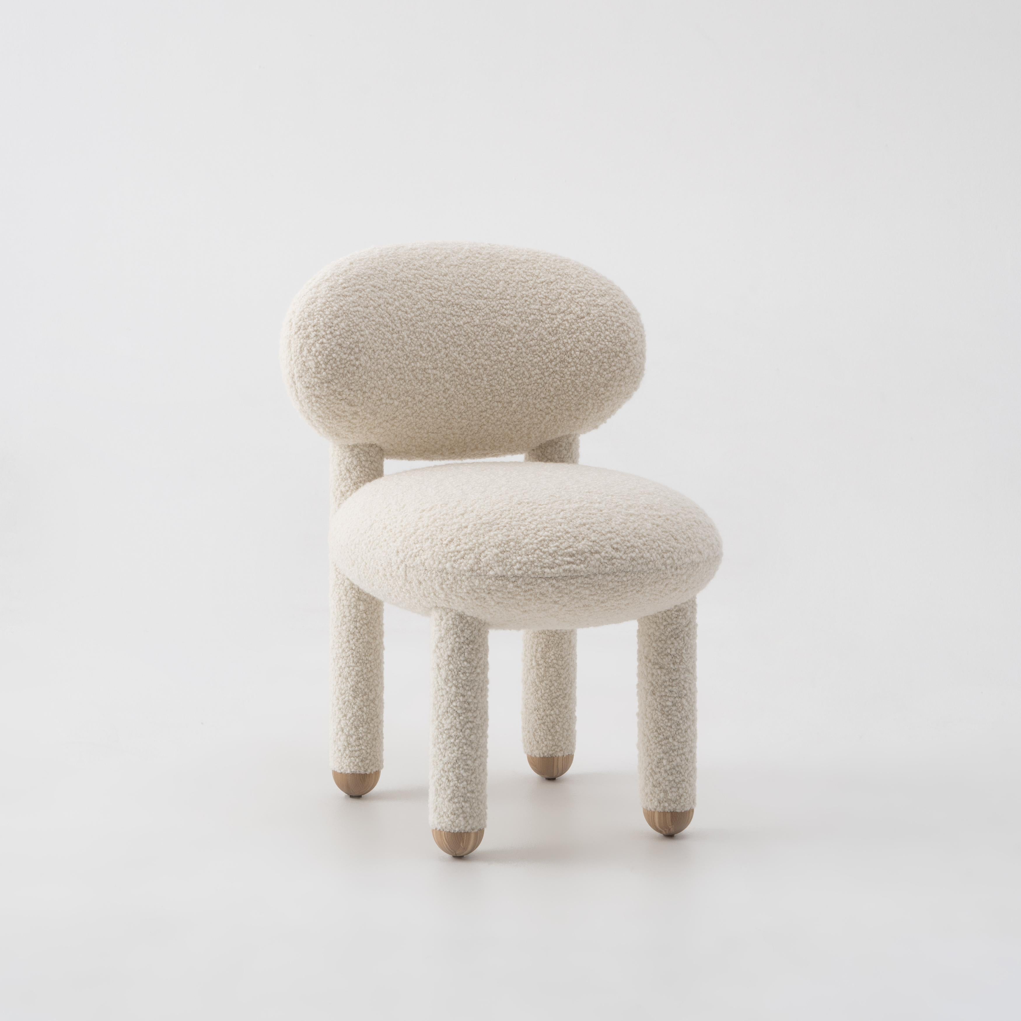 https://a.1stdibscdn.com/modern-dining-chair-flock-cs1-in-dedar-nimbus-boucle-fabric-by-noom-for-sale-picture-3/f_42321/f_367413821698008918502/Flock_chair_CS1_by_NOOM_1__master.jpg