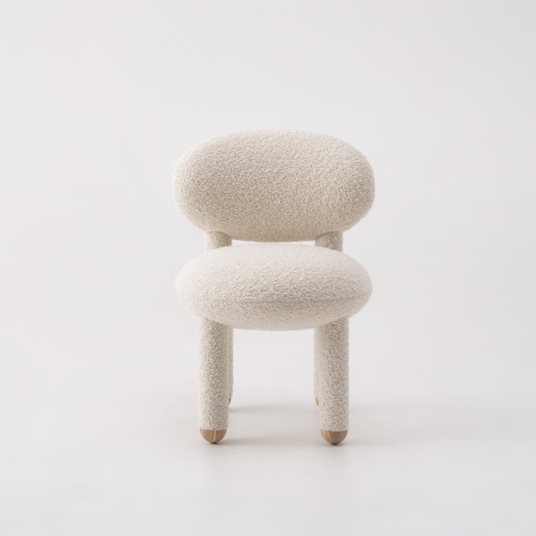 https://a.1stdibscdn.com/contemporary-dining-chair-flock-cs1-by-noom-baloo-orange-for-sale-picture-12/32076752/f_391269421712215121385/Flock_chair_CS1_by_NOOM_3_master_master.jpg?width=768
