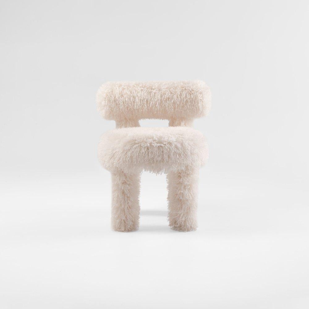 https://a.1stdibscdn.com/contemporary-dining-chair-fluffy-by-noom-gropius-cs1-for-sale-picture-4/f_31233/f_387207621709717600653/Fluffy_Chair_Gropius_CS1_in_Azur_Cotonneux_Faux_Fur_3__master.jpeg