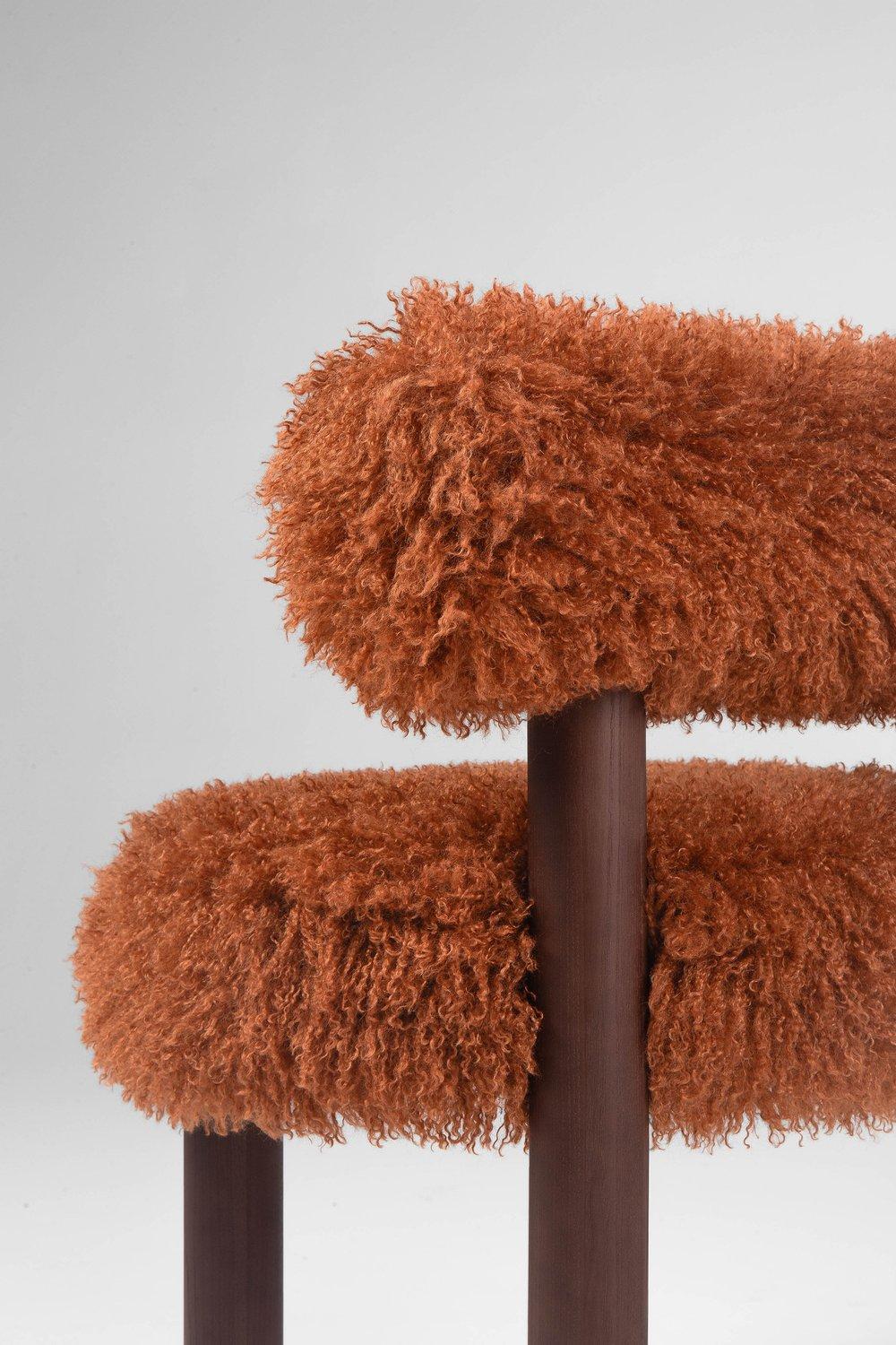 https://a.1stdibscdn.com/contemporary-dining-chair-fluffy-by-noom-gropius-cs2-orange-for-sale-picture-5/f_31233/f_387213321709719013904/Fluffy_Chair_Gropius_CS2_in_Azur_Cotonneux_Faux_Fur_21__master.jpeg
