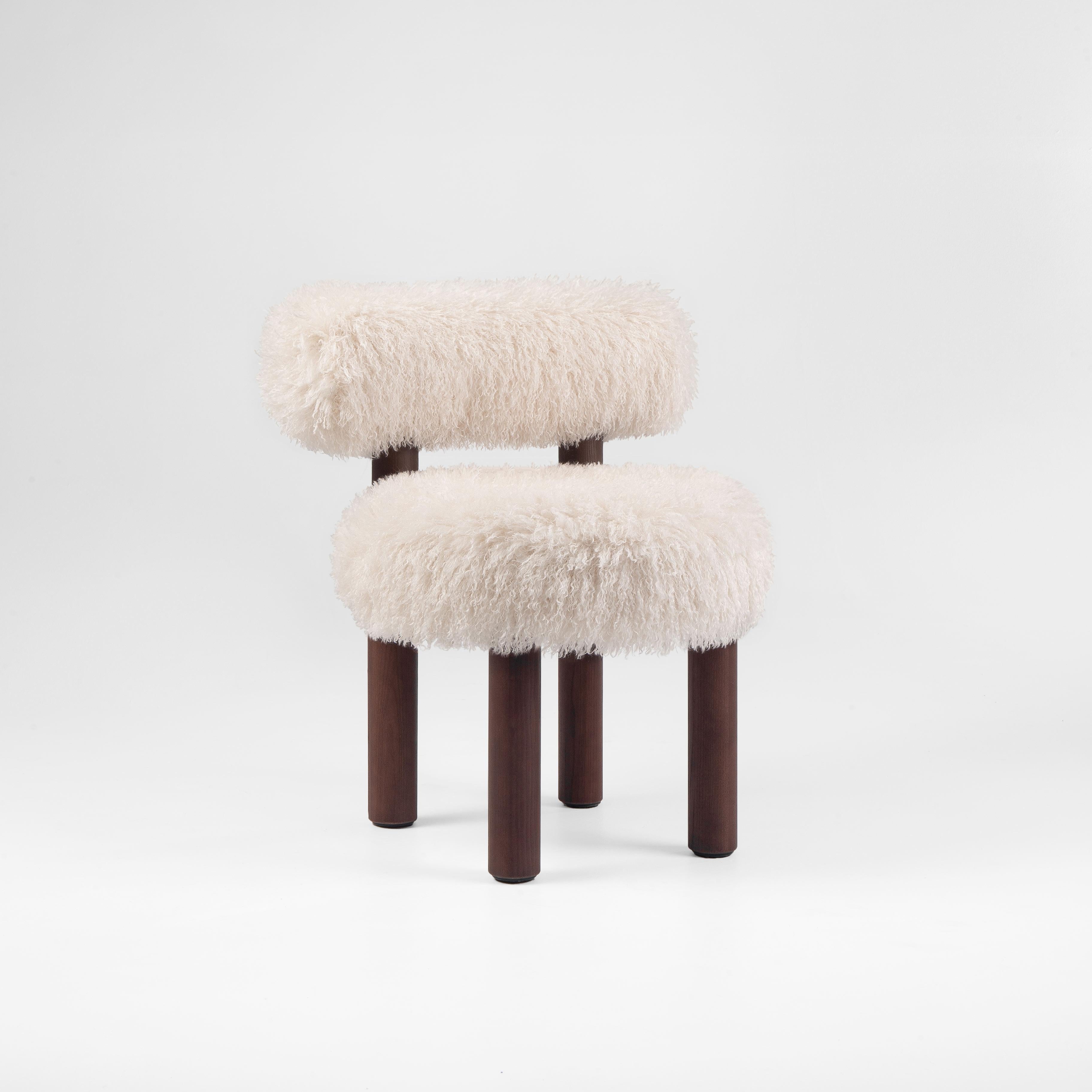 https://a.1stdibscdn.com/modern-dining-chair-gropius-cs2-fluffy-with-wooden-legs-in-azur-faux-fur-by-noom-for-sale-picture-18/f_42321/f_423059321731575412877/Fluffy_Chair_Gropius_CS2_in_Azur_Cotonneux_Faux_Fur_2__master.jpg