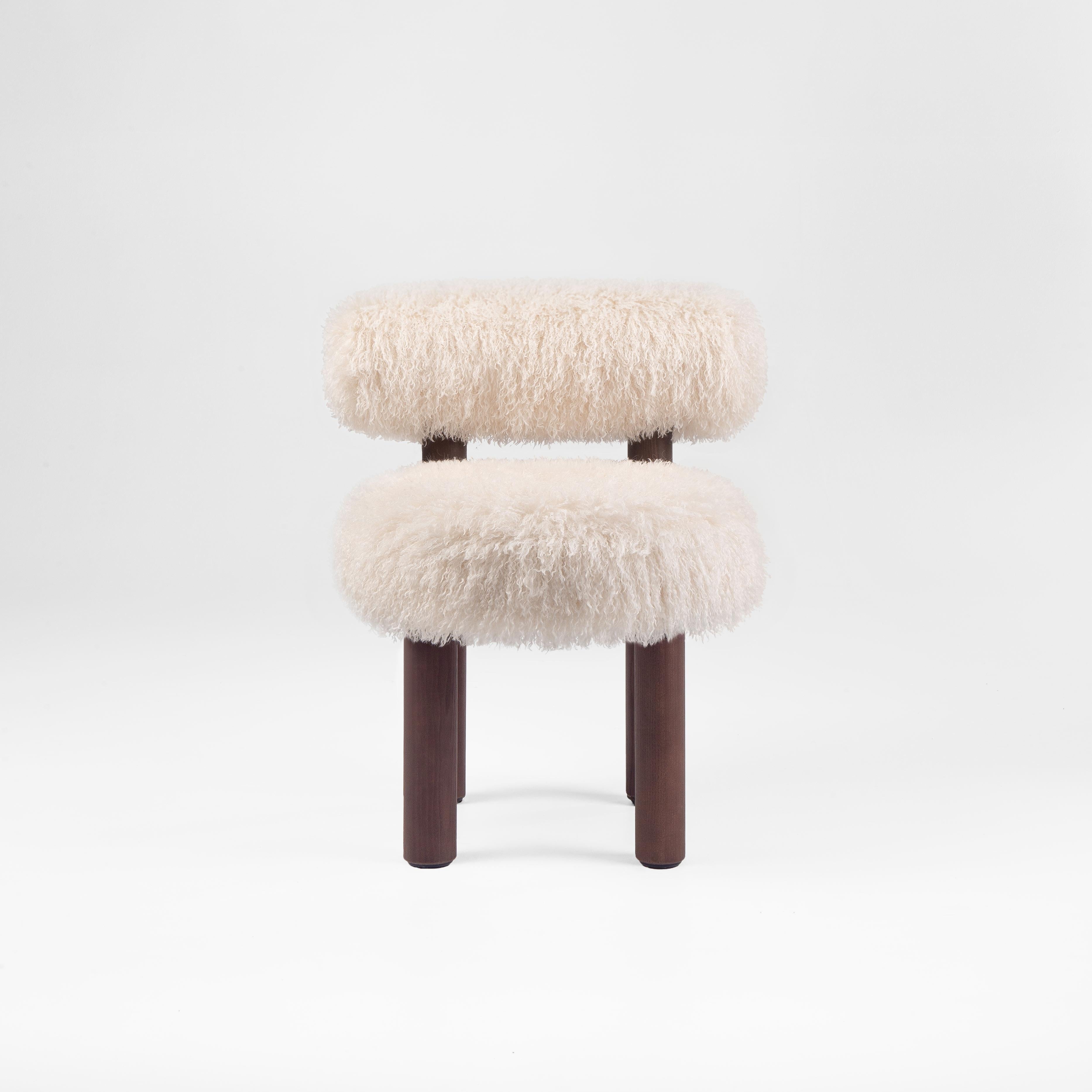 https://a.1stdibscdn.com/modern-dining-chair-gropius-cs2-fluffy-with-wooden-legs-in-azur-faux-fur-by-noom-for-sale-picture-2/f_42321/f_422502421731236690645/Fluffy_Chair_Gropius_CS2_in_Azur_Cotonneux_Faux_Fur_4__master.jpg
