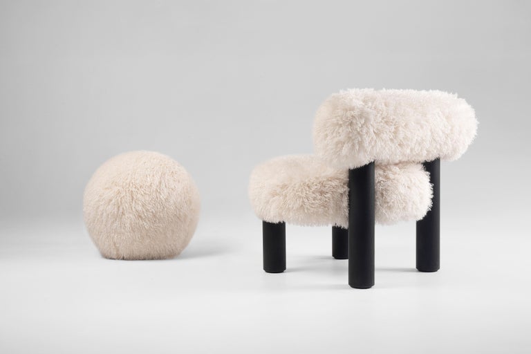 https://a.1stdibscdn.com/modern-low-chair-gropius-cs2-fluffy-in-azur-faux-fur-with-wooden-legs-by-noom-for-sale-picture-6/f_42321/f_422472121731182053262/Fluffy_Low_Chair_Gropius_CS2_in_Azur_Cotonneux_Faux_Fur_5__master.jpg?width=768