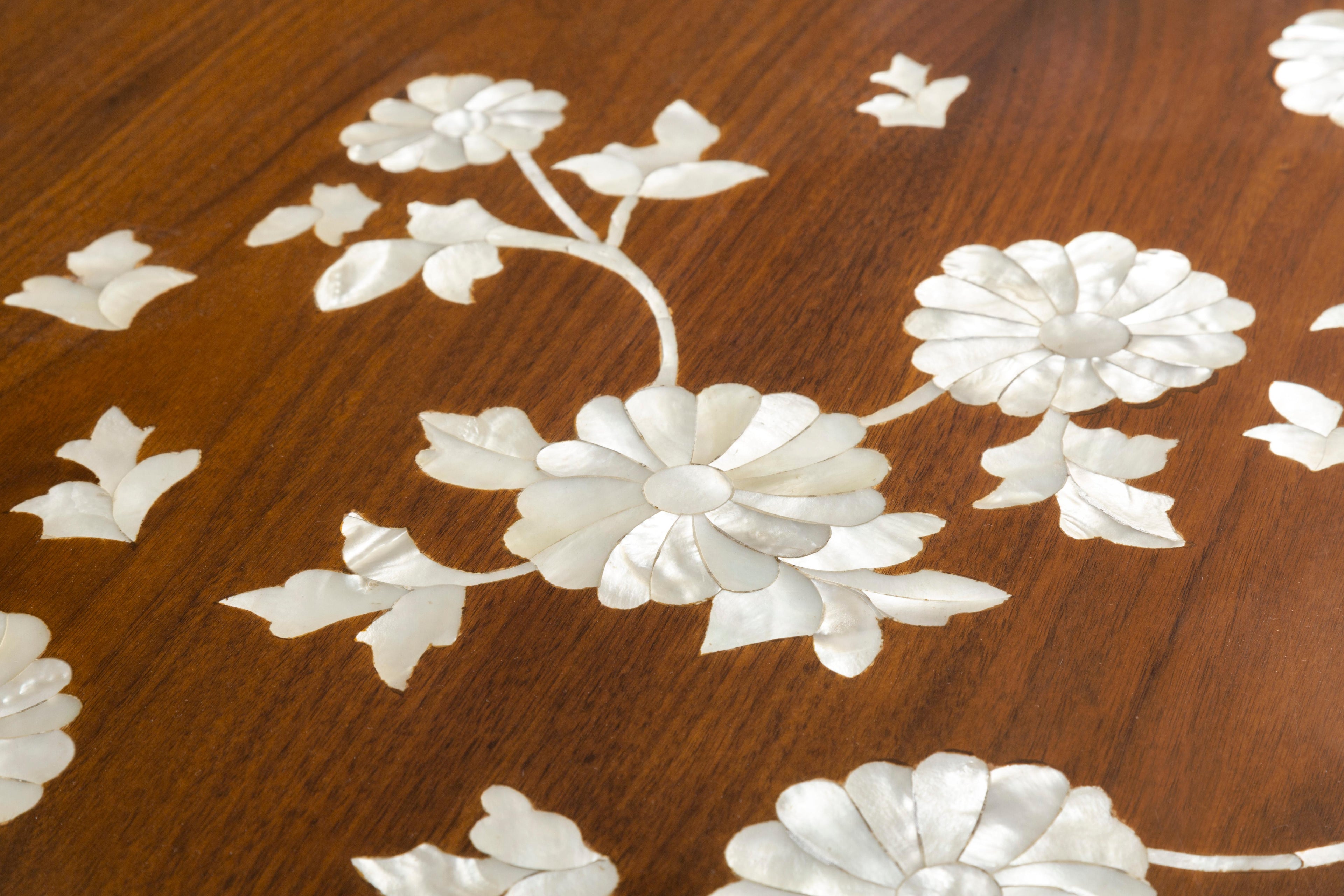 https://a.1stdibscdn.com/dining-table-with-hand-laid-floral-mother-of-pearl-massive-curved-walnut-legs-for-sale-picture-7/f_58022/f_390839321711913414237/For_The_Love_of_Flowers_Dining_Table_Detail_2_master.jpg