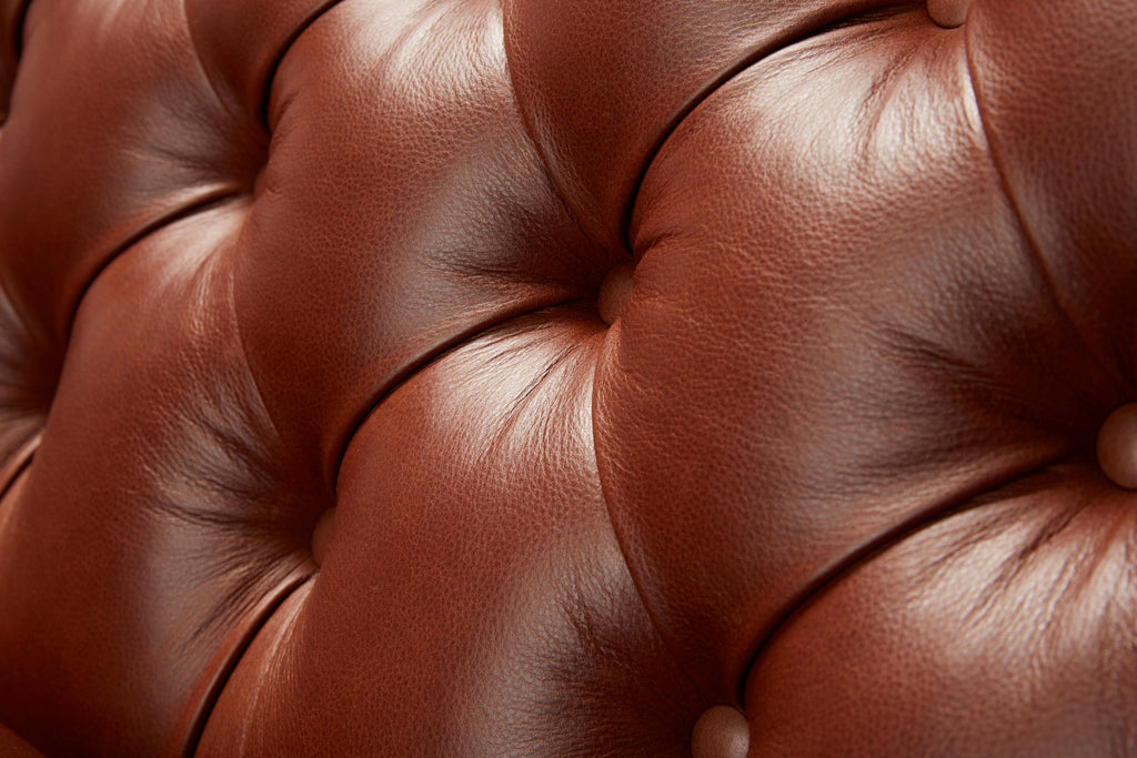 https://a.1stdibscdn.com/contemporary-leather-formalis-deep-buttoned-back-sofa-in-with-oak-or-walnut-legs-for-sale-picture-6/f_27813/f_436643821739800762348/FormalisSofa_brownleather9886_1_FIN_master.jpg