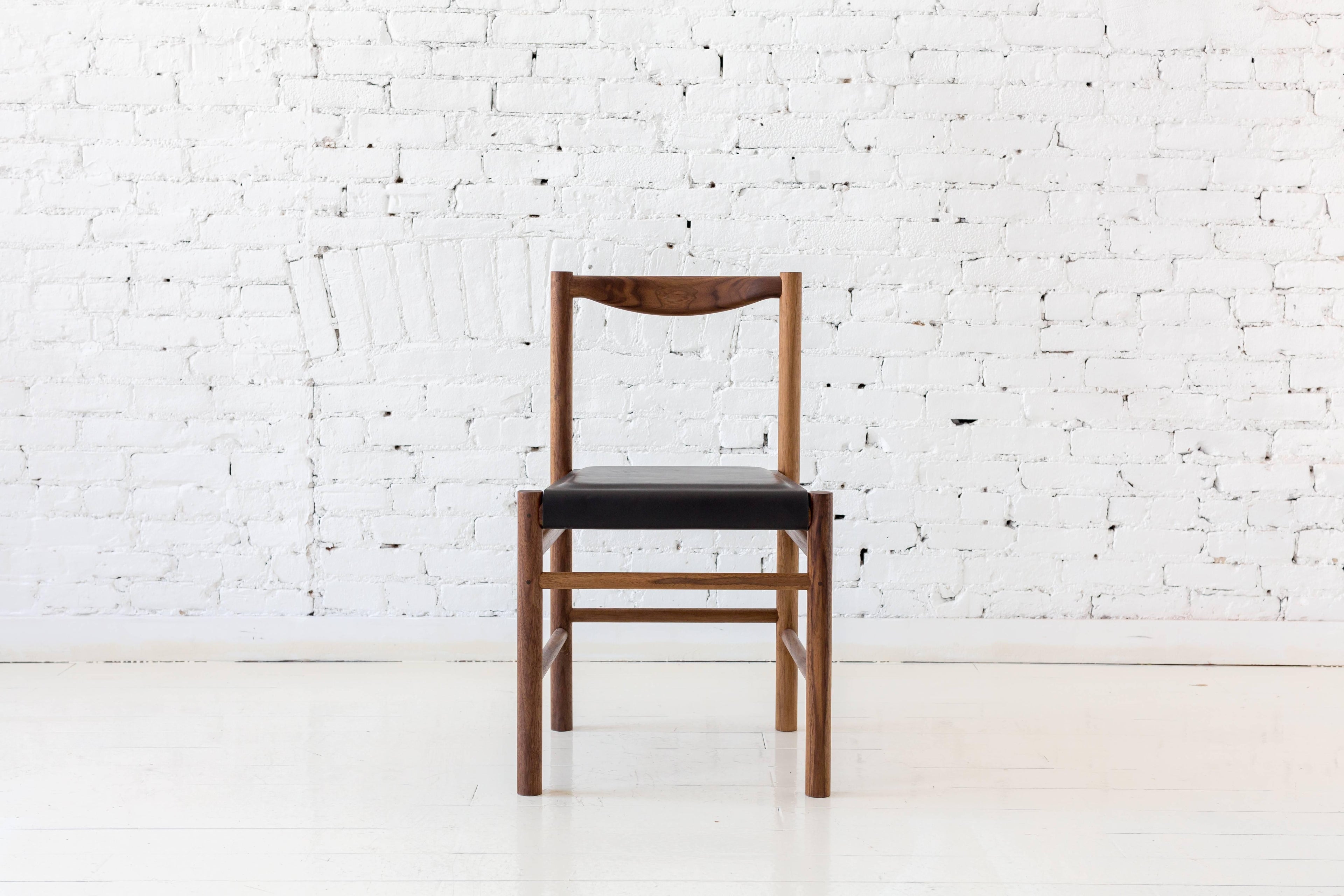 https://a.1stdibscdn.com/range-dining-chair-in-walnut-and-leather-by-fort-standard-for-sale-picture-2/archivesE/upload/f_36481/f_105194831524097278425/FtStd_BFerry_May2016_15_master.jpg