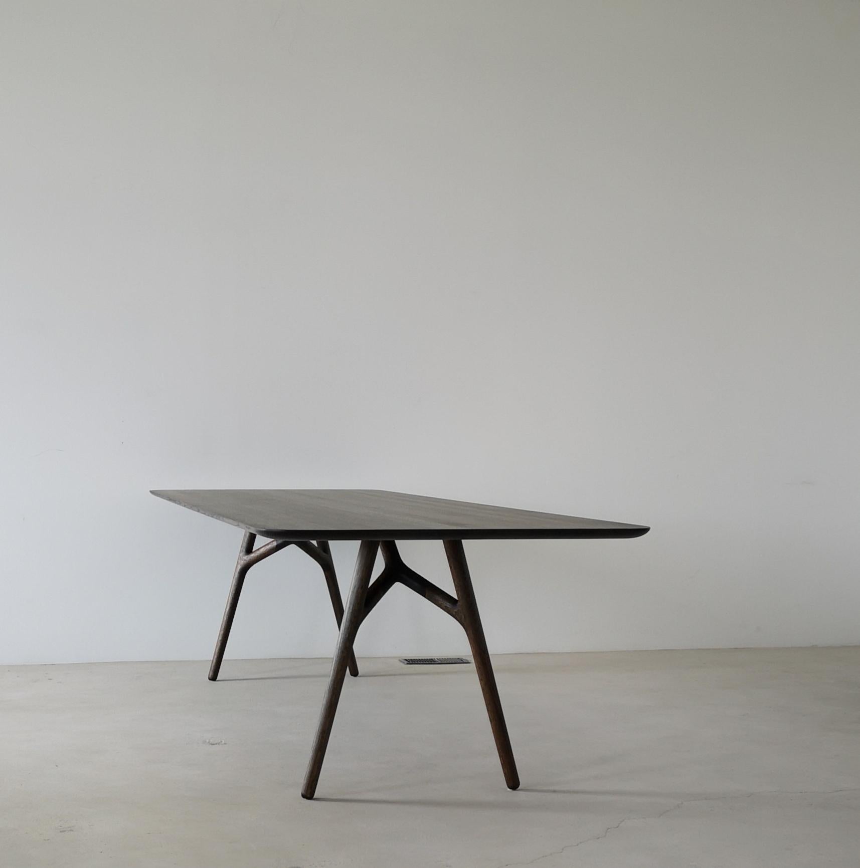 https://a.1stdibscdn.com/furcula-modern-solid-wood-dining-table-by-izm-design-for-sale-picture-2/f_51211/f_195104521592332644401/Furcula_main_master.jpg