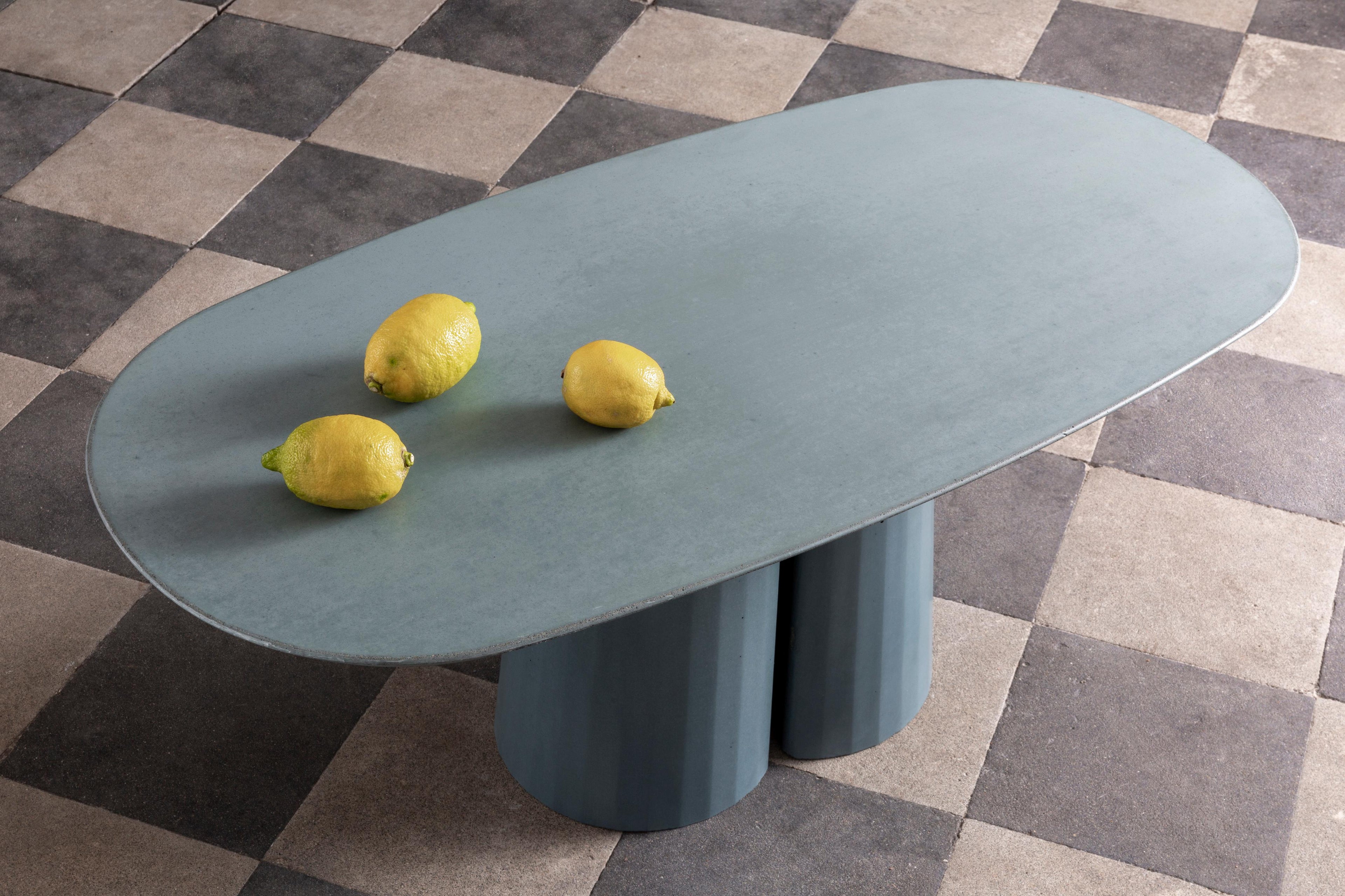 https://a.1stdibscdn.com/concrete-domestic-landscape-oval-coffee-table-ultramarine-cement-made--for-sale-picture-5/f_38941/f_313228721668526492558/Fusto_Oval_Coffee_Talbe_II_design_by_Marialaura_Irvine_per_FormaandCemento_Ph_Serena_Eller_Location_Palazzo_Brancaccio_1__master.jpg