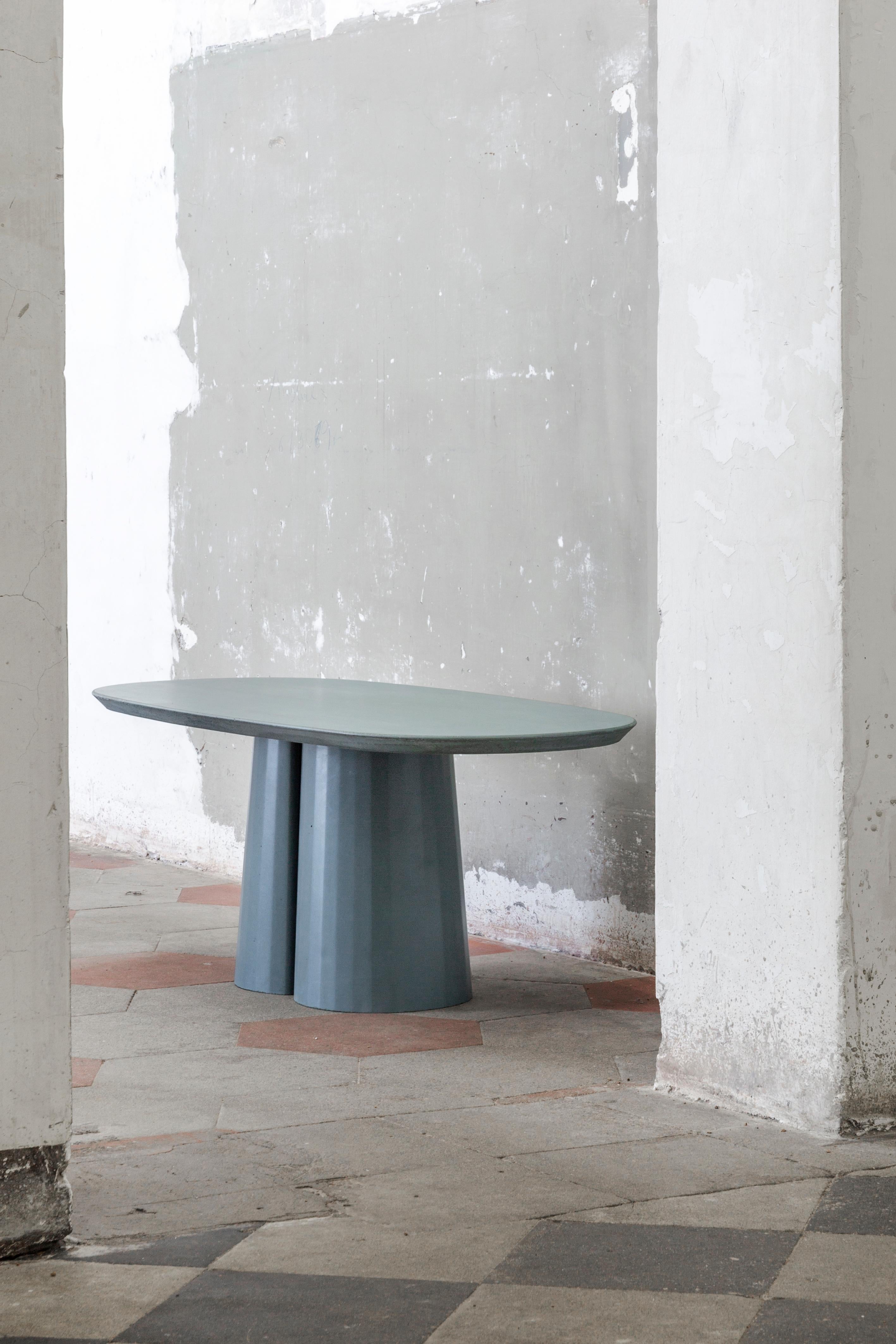 https://a.1stdibscdn.com/concrete-domestic-landscape-oval-coffee-table-ultramarine-cement-made--for-sale-picture-4/f_38941/f_313228721668526472807/Fusto_Oval_Coffee_Talbe_II_design_by_Marialaura_Irvine_per_FormaandCemento_Ph_Serena_Eller_Location_Palazzo_Brancaccio_2__master.jpg