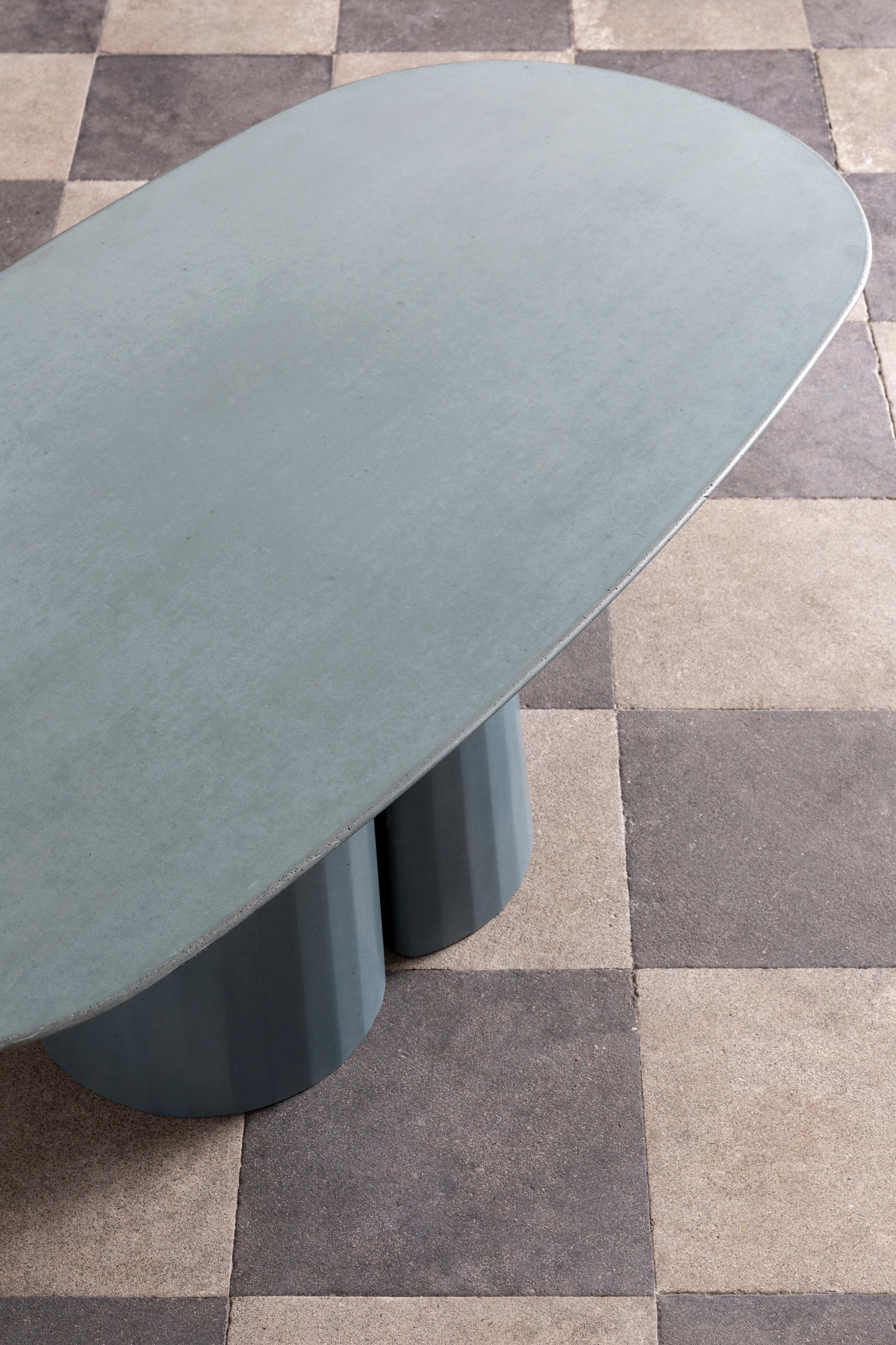 https://a.1stdibscdn.com/concrete-domestic-landscape-oval-coffee-table-ultramarine-cement-made--for-sale-picture-6/f_38941/f_313228721668526518139/Fusto_Oval_Coffee_Talbe_II_design_by_Marialaura_Irvine_per_FormaandCemento_Ph_Serena_Eller_Location_Palazzo_Brancaccio_4__master.jpg