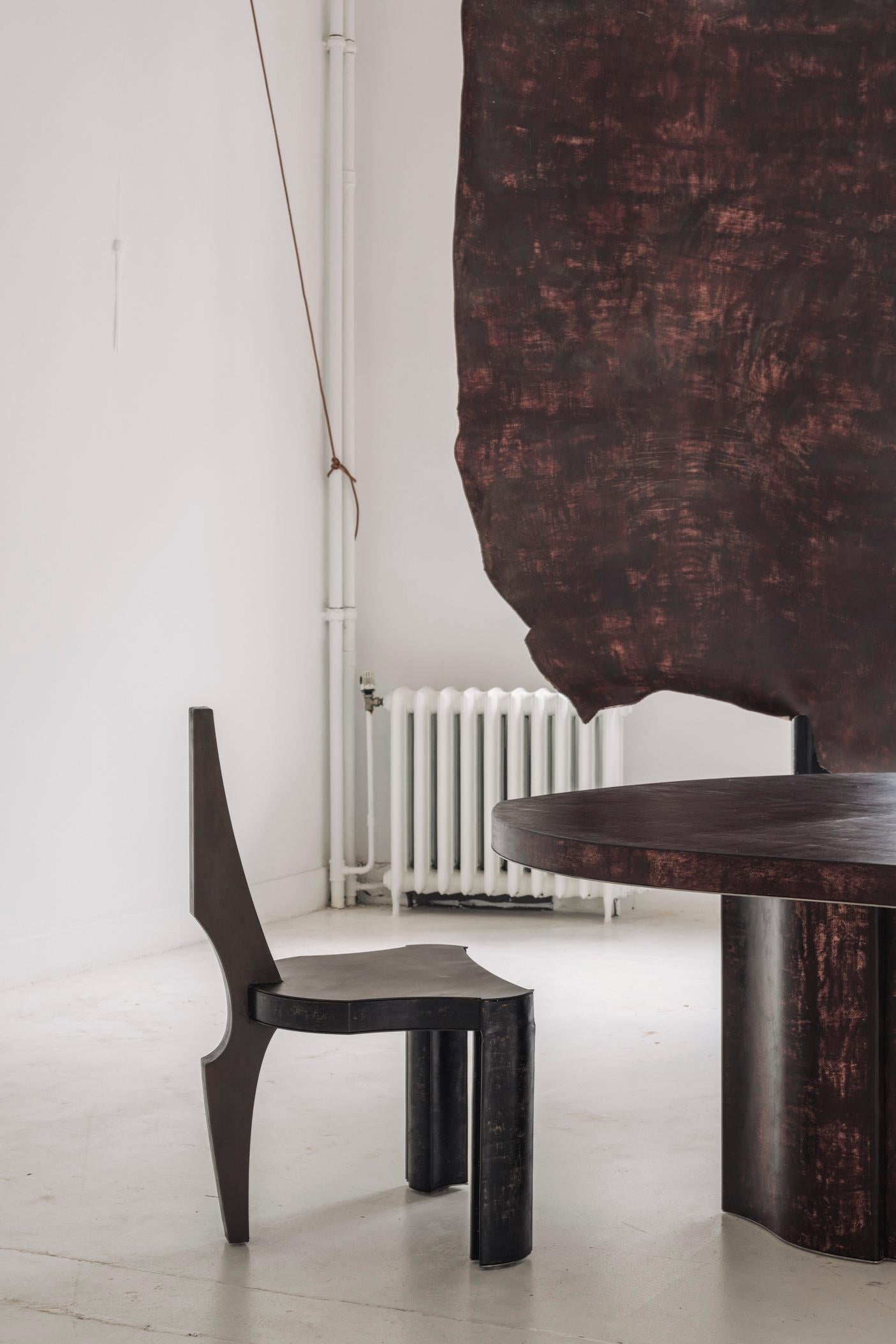 https://a.1stdibscdn.com/contemporary-fragment-dining-table-burgundy-patinated-leather-for-sale-picture-5/f_70152/f_437891521740471745421/_G6A0248_master.jpg