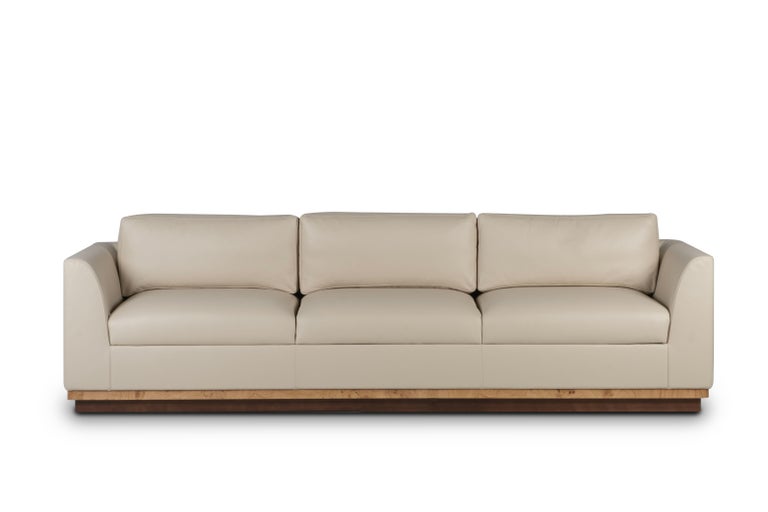 https://a.1stdibscdn.com/mid-century-modern-french-style-sofa-cannes-beige-leather-handmade-greenapple-for-sale-picture-3/f_53532/f_454279021749745947541/G704652_master.jpg?width=768
