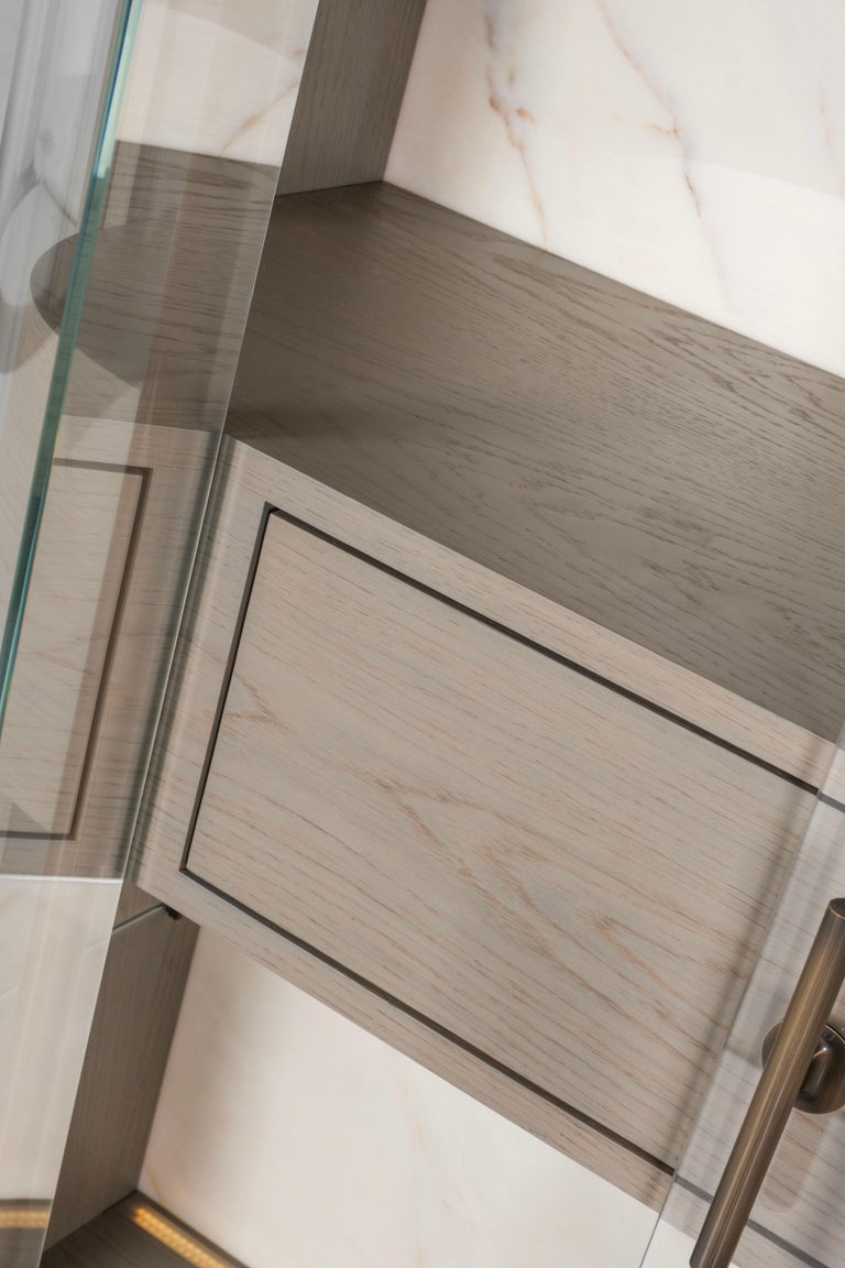https://a.1stdibscdn.com/modern-penedo-showcase-bar-cabinet-calacatta-bianco-handmade-portugal-greenapple-for-sale-picture-7/f_53532/f_440793921742220620481/G704736_6_master.jpg?width=768