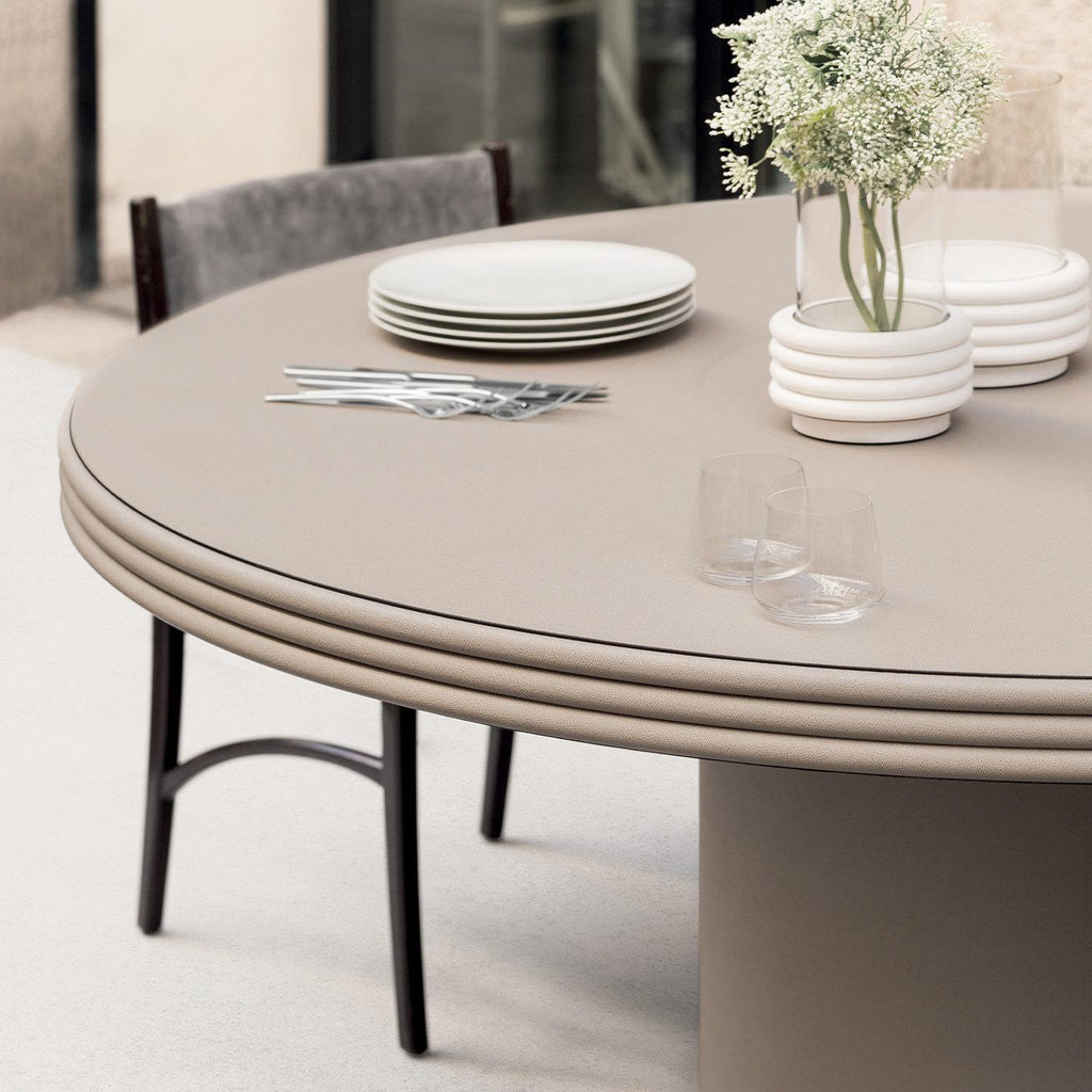 https://a.1stdibscdn.com/round-leather-dining-table-scala-by-stephane-parmentier-for-giobagnara-for-sale-picture-3/f_58132/f_249401621629219804935/GIOBGE_303_A20200313_9_13s5q2d_master.jpeg