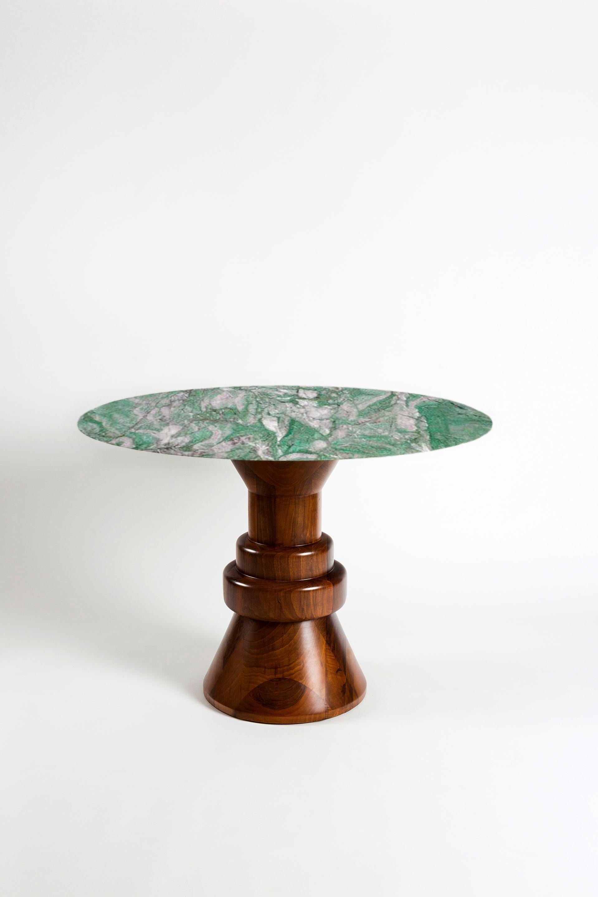 https://a.1stdibscdn.com/21st-century-cream-marble-round-dining-table-with-sculptural-wooden-base-for-sale-picture-10/f_36601/f_216814221607120541183/GREEN2_master.jpg