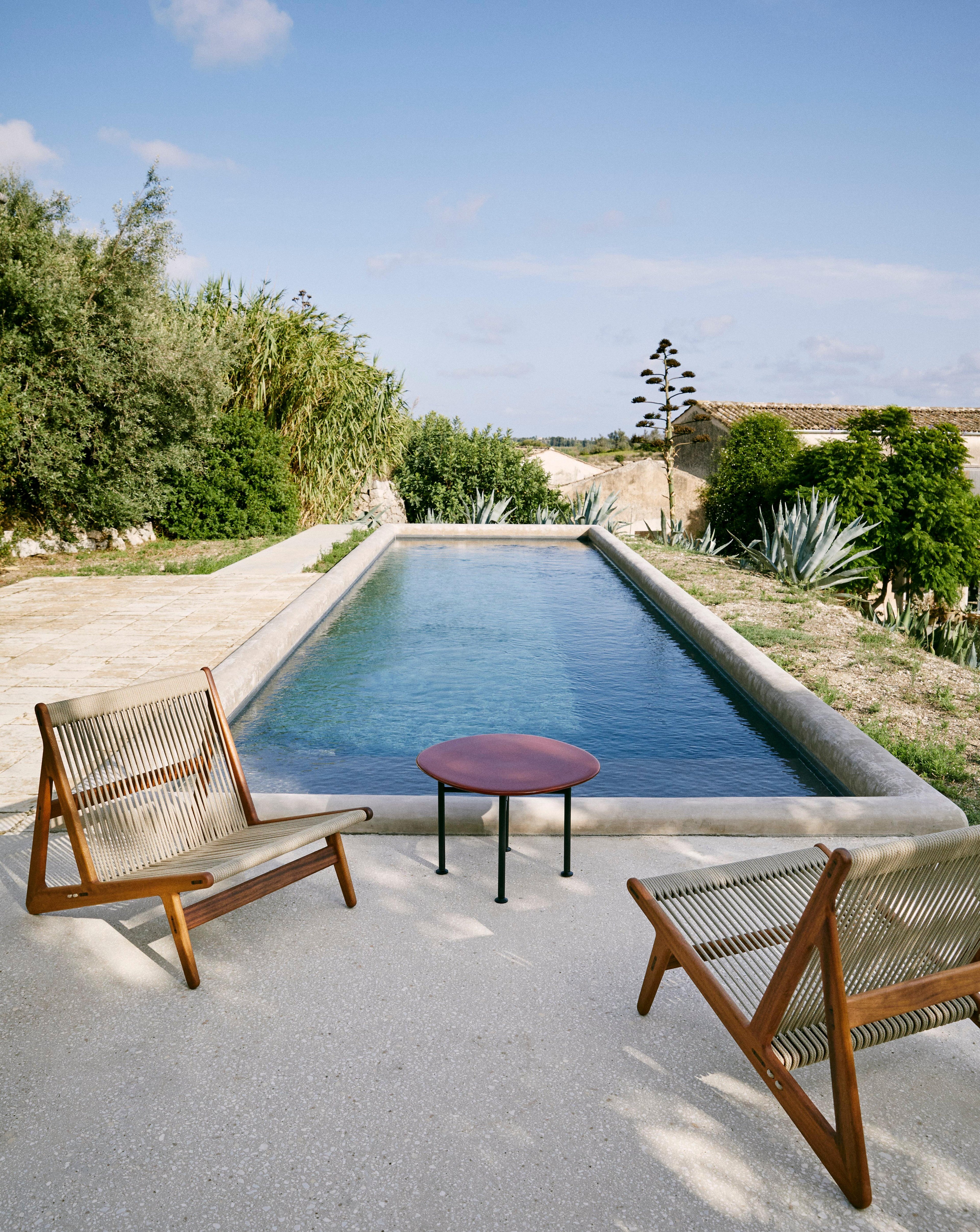 https://a.1stdibscdn.com/rasmussen-mr01-indoor-outdoor-initial-chair-in-iroko-wood-for-gubi-for-sale-picture-5/f_14472/f_442007721742865241754/GUBI_SICILIA121410220601_master.jpeg