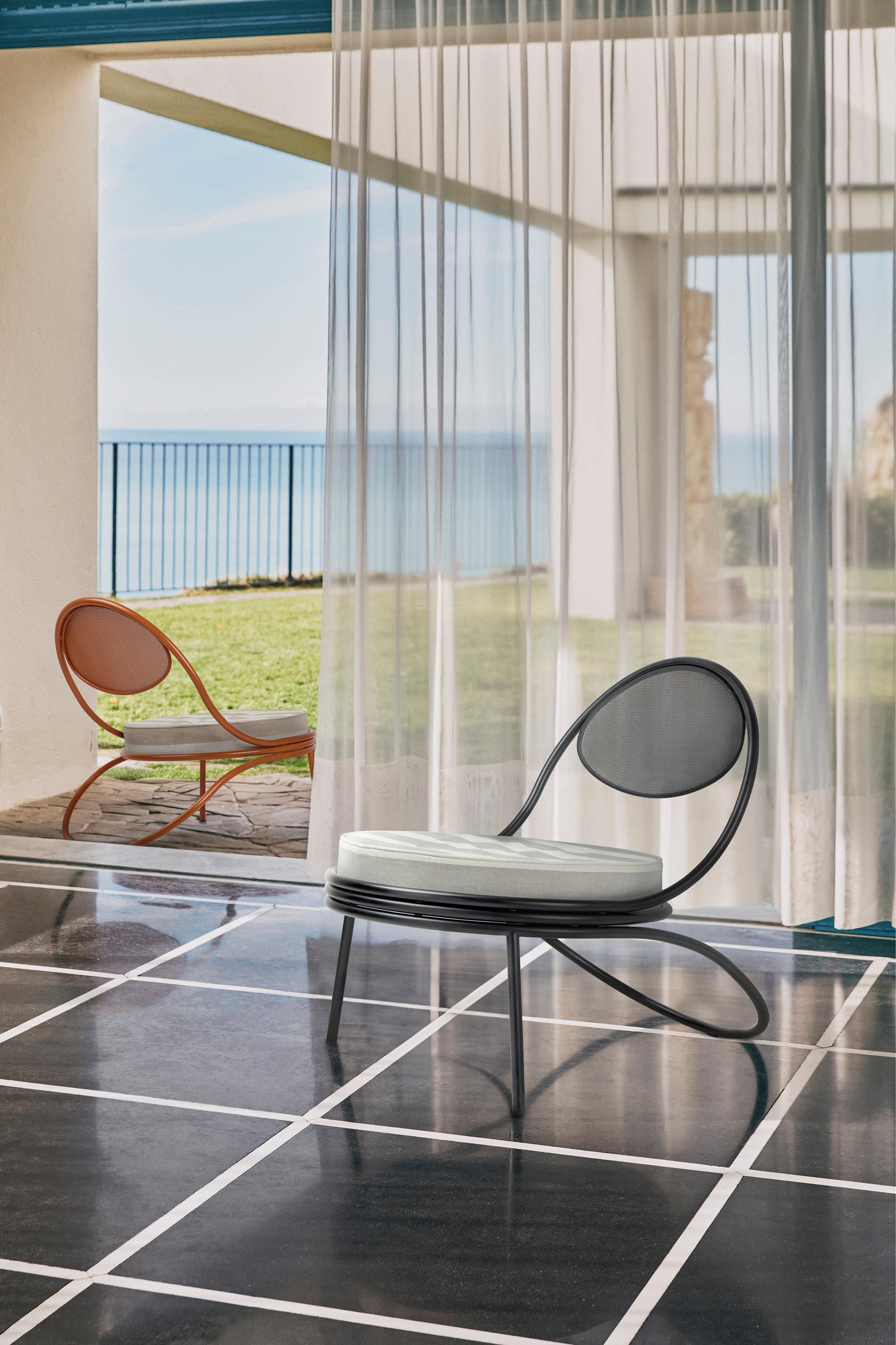 https://a.1stdibscdn.com/copacabana-indoor-outdoor-lounge-chair-by-mathieu-mategot-in-leslie-fabric-for-sale-picture-2/f_14472/f_389798821711185509994/GUBI_SPRING_24_Copacabana_01_hero_master.jpg