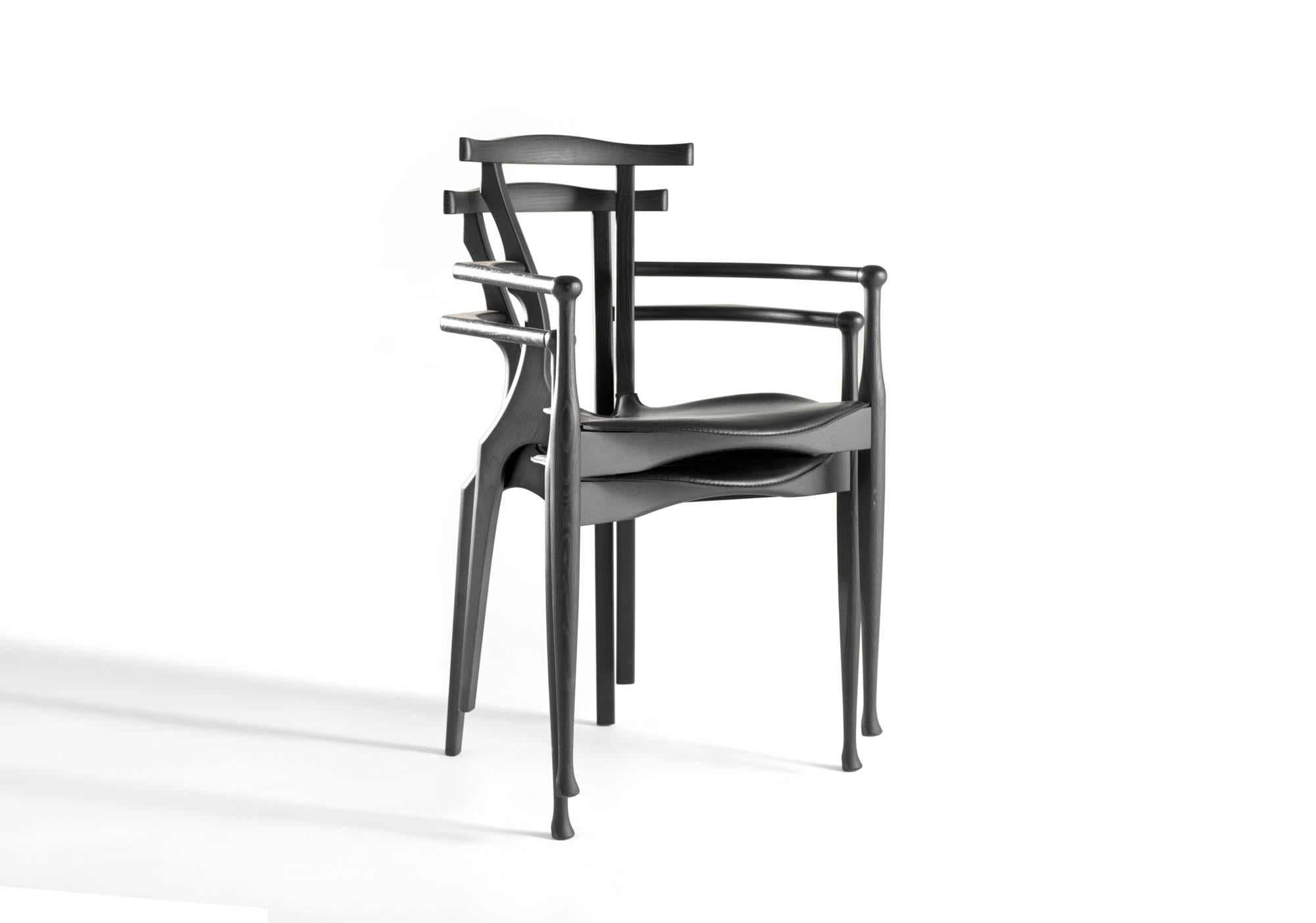 https://a.1stdibscdn.com/gaulino-chair-black-for-sale-picture-2/f_30483/f_110228931528473995383/Gaulino_apiladas_1_ok_master.jpg