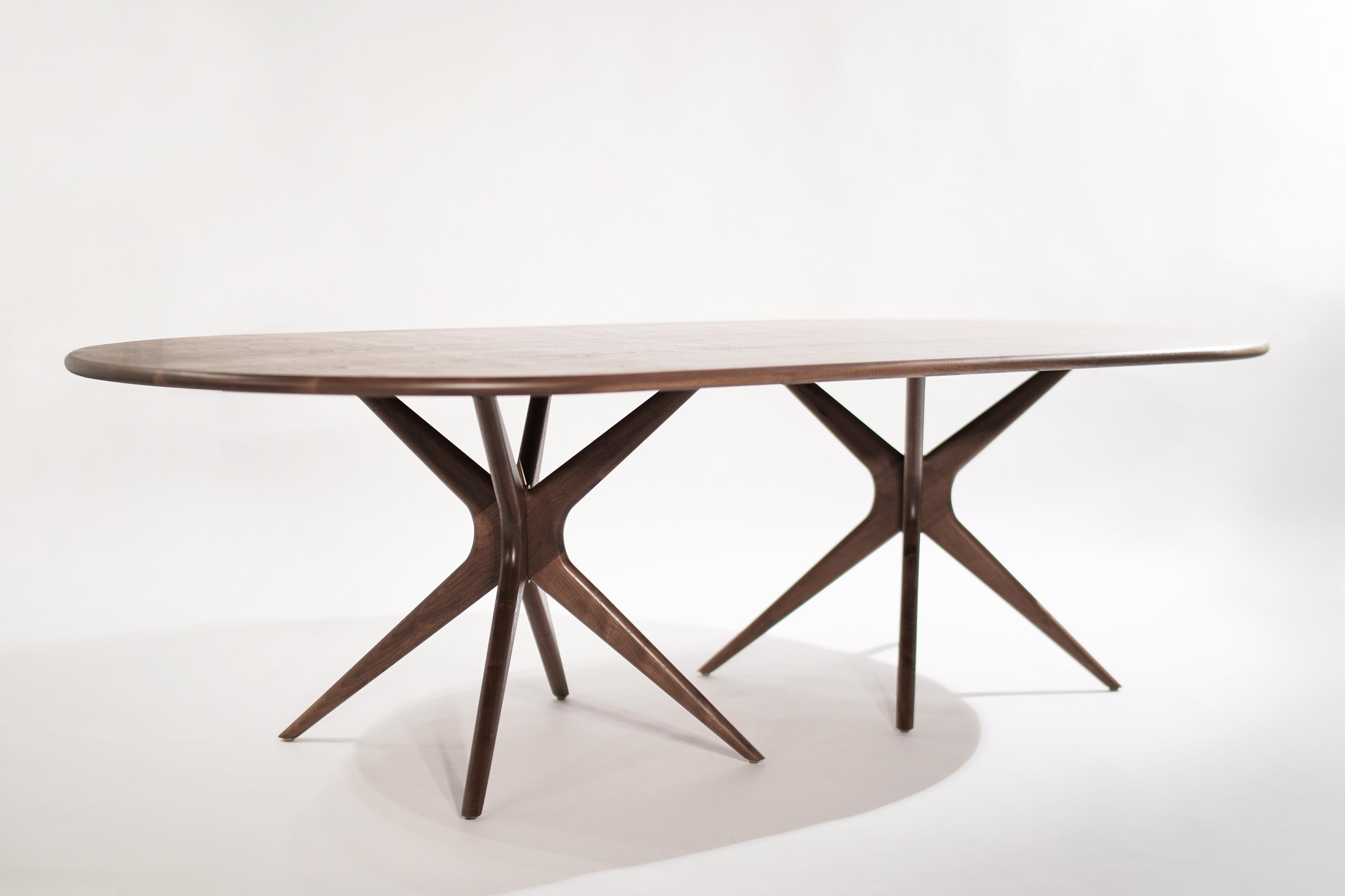https://a.1stdibscdn.com/stamford-moderns-gazelle-dining-table-in-walnut-oval-version-for-sale-picture-2/f_9289/f_263758221638529121500/Gazelle_Dinning_Table_1_master.jpg